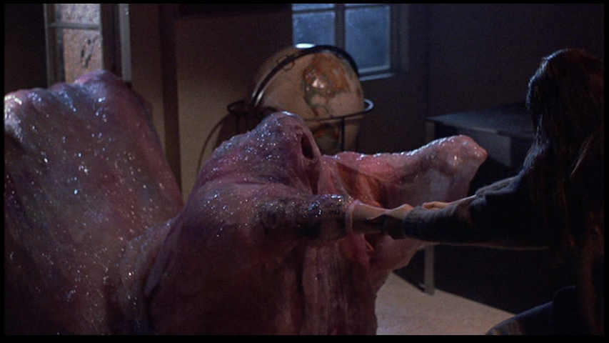 The Blob eats a victim in the 1988 remake of the 1958 film.