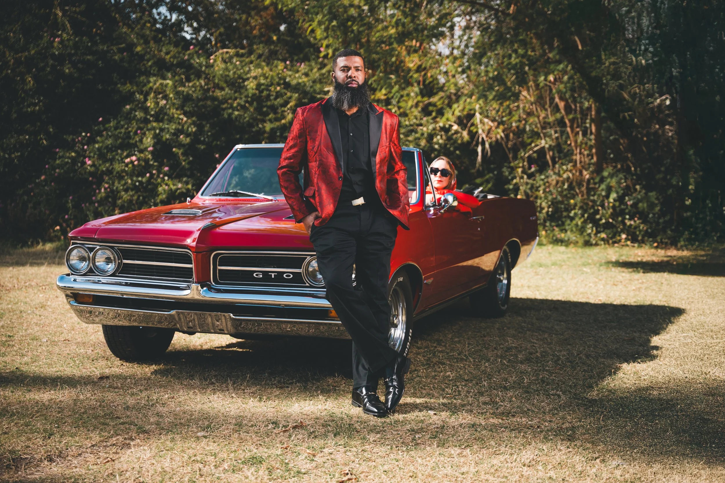 Red GTO meadow man woman dapper Mesa Arizona.jpg