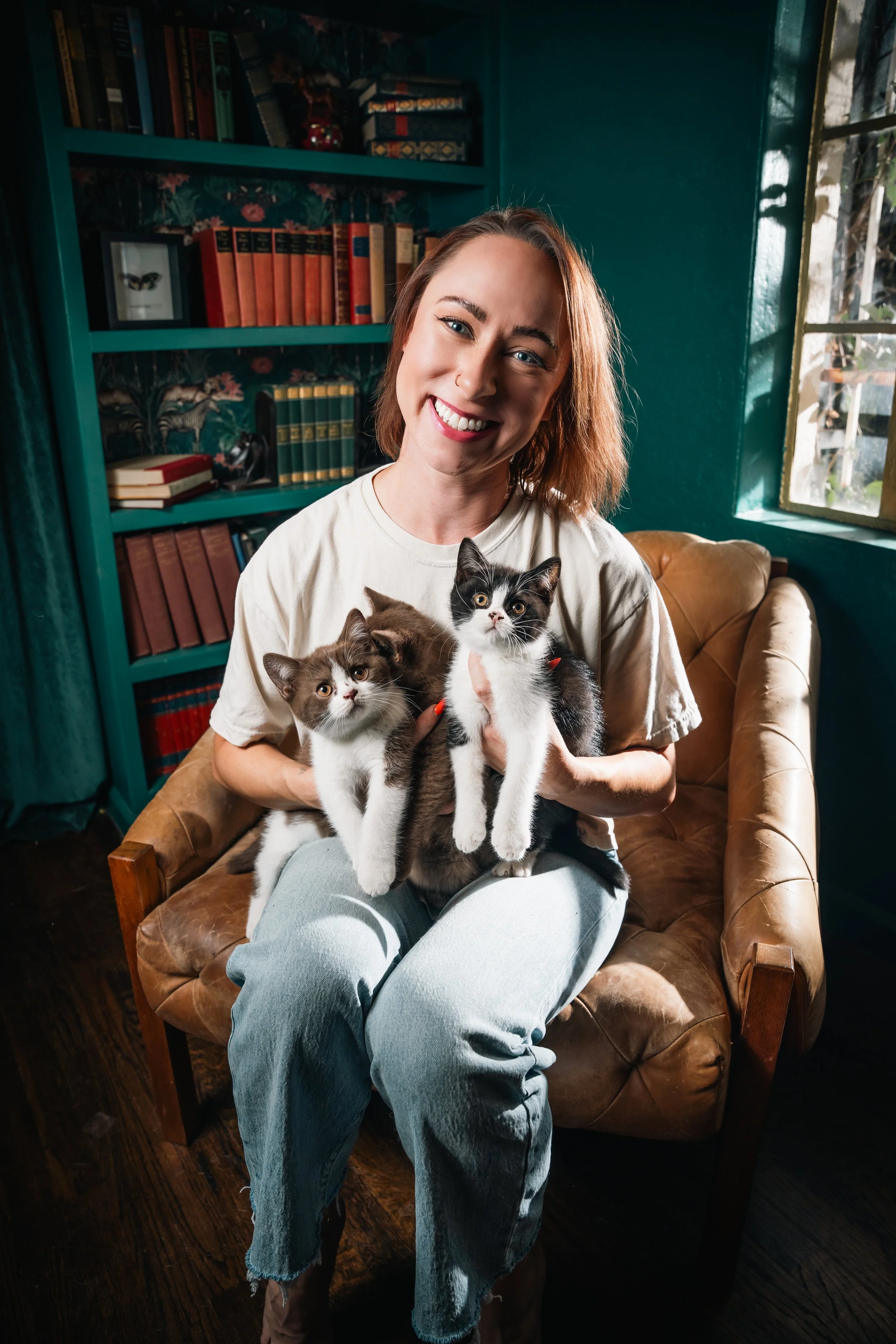 kittens library brown chair portrait.jpg