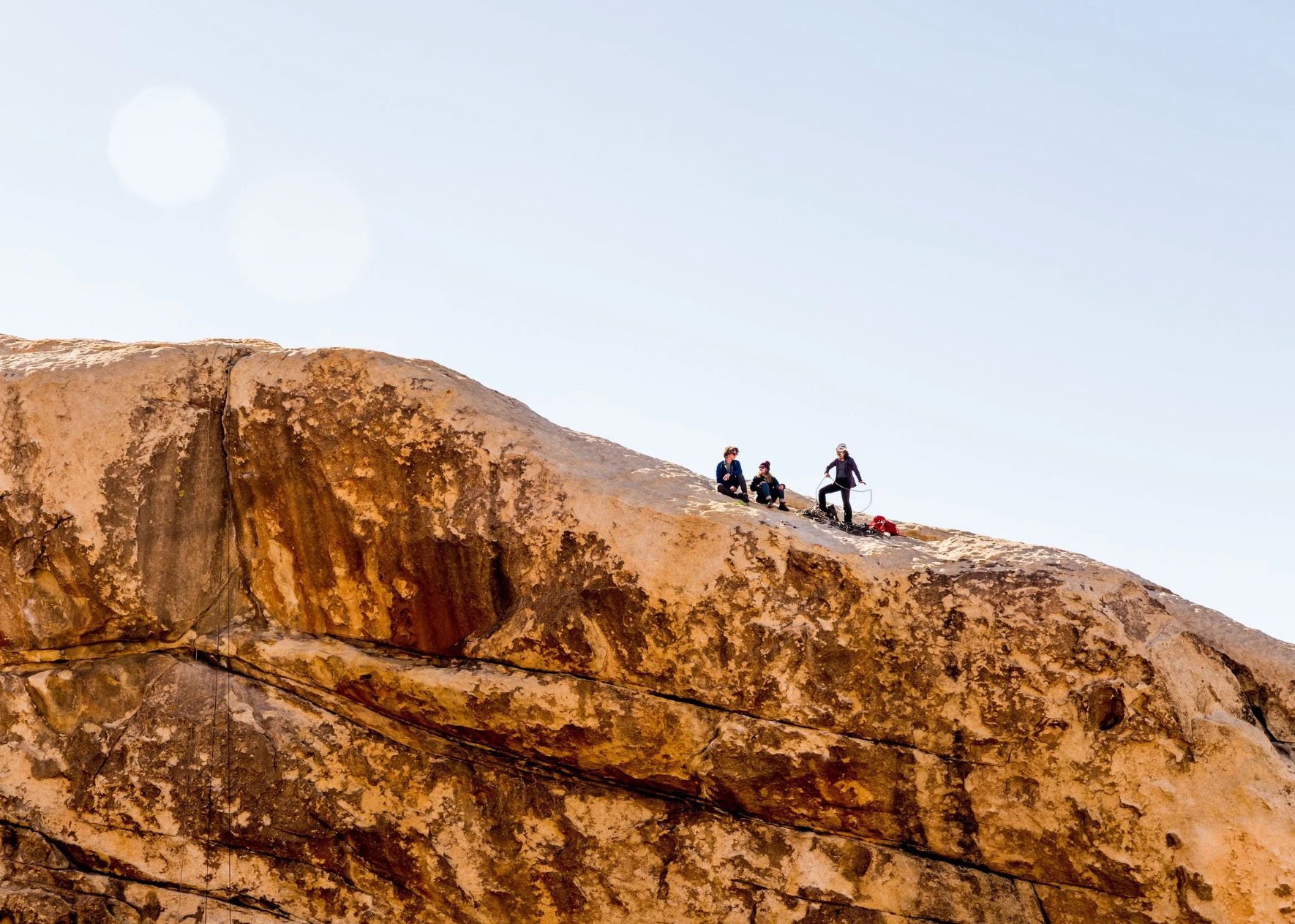 rock-climbers-on-rock-ledge-with-rope-Joshua-Tree-NP-web.jpg