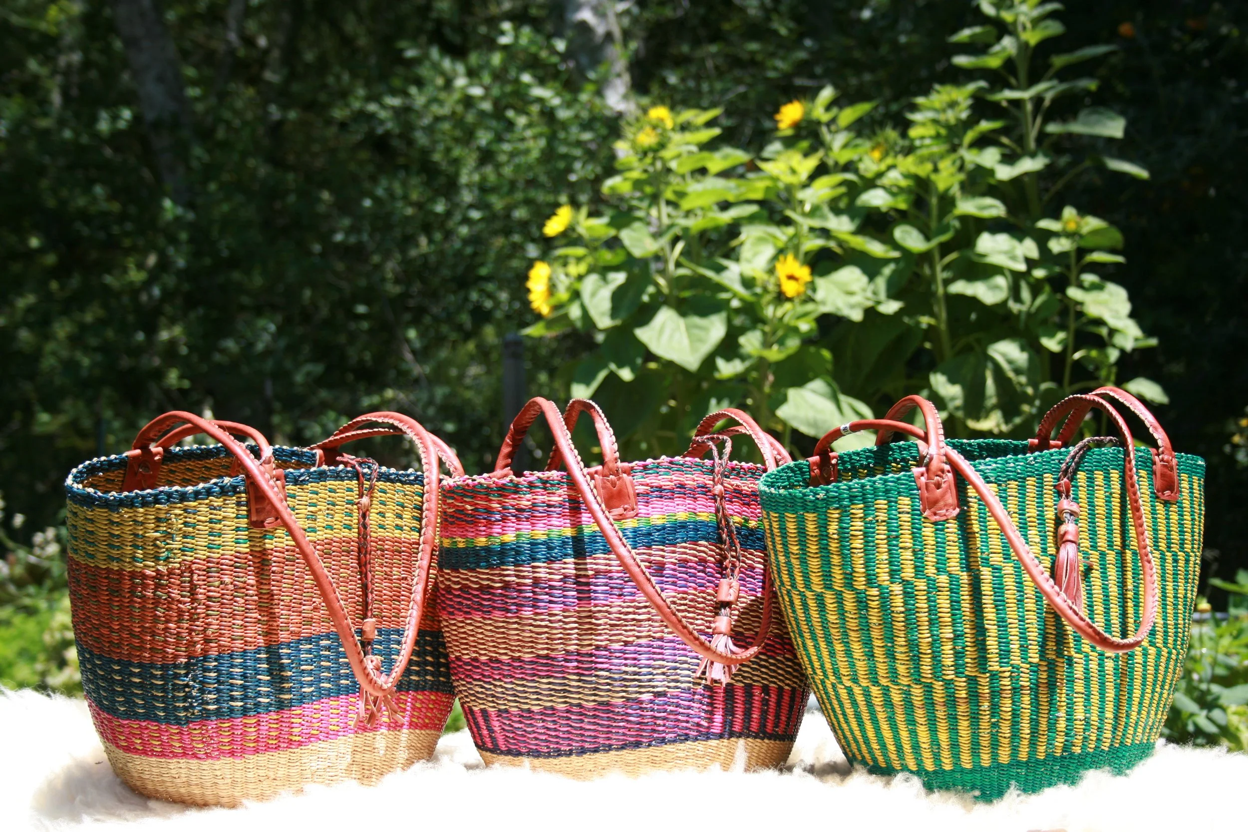 Harvest, lunch, school, these versatile baskets boast a leather shoulder strap