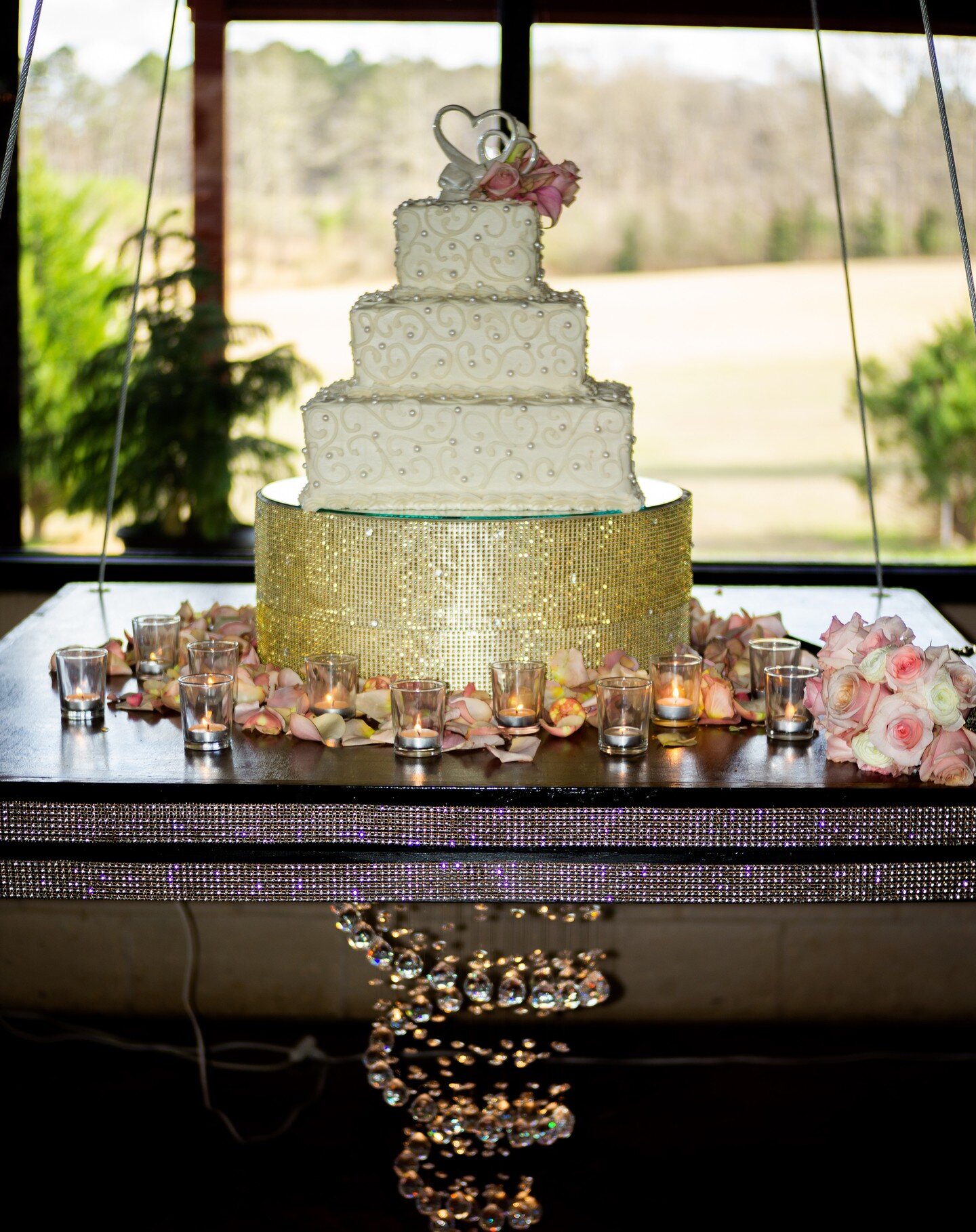 A closeup shot of an impeccably designed cake atop a floating stand. We love the floral detailing, accented with small candles that will truly stand out and increase the intimacy of the night.
.
.
.
.
.
.
.
#pavilion #event #eventplanner #eventplanni