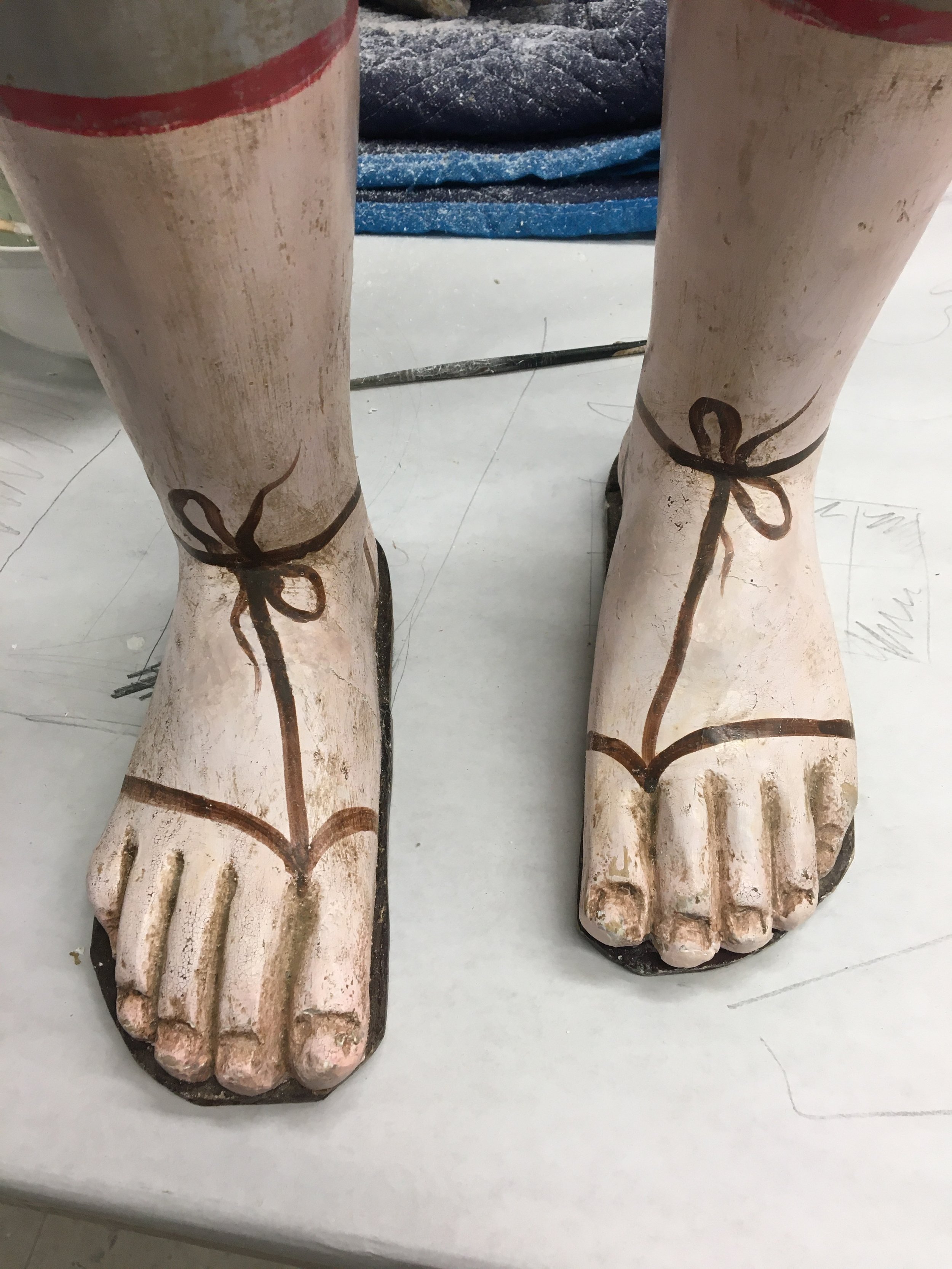 After consolidation, the losses were filled with traditional gesso and the color matched with Conservation paints