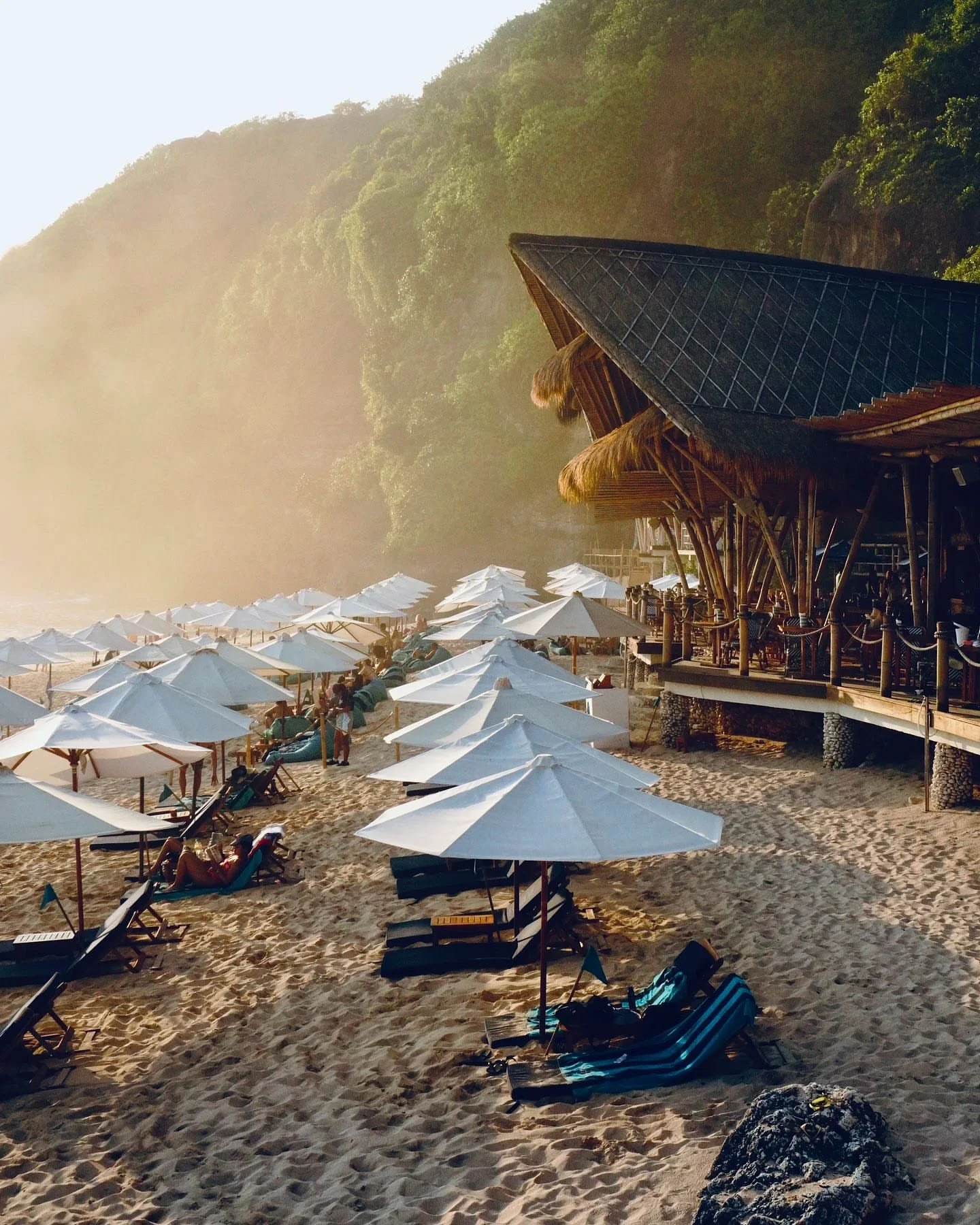 Golden light, soft sand, and slow moments &mdash; Sundays Beach Club in Uluwatu is where barefoot luxury meets laid-back bliss.