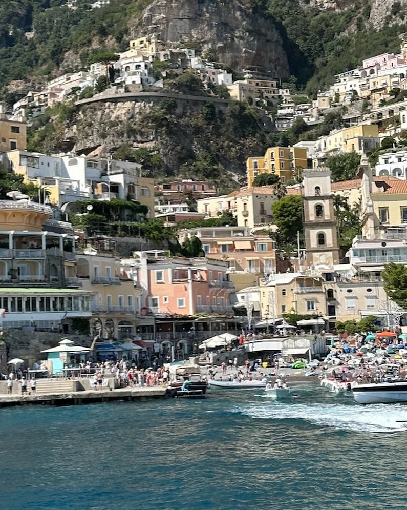 That first glimpse of Positano from the water &mdash; like a dream built into the cliffs, bursting with color and charm.