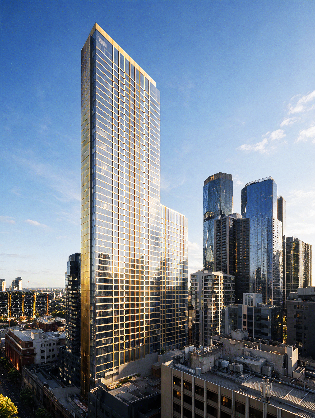 640 Bourke Street Melbourne apartment tower exterior with golden facade illuminated by morning sunlight against the CBD skyline.
