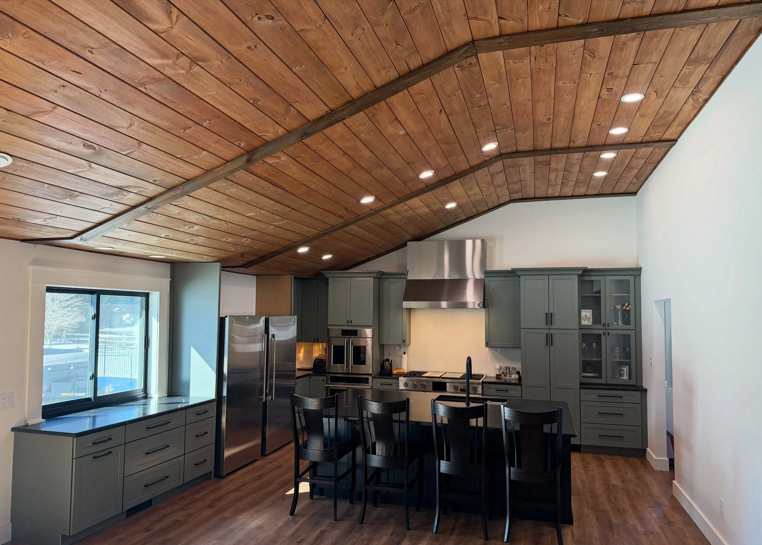 Full kitchen refresh with warm wood tones, modern appliances, and tight finish work.