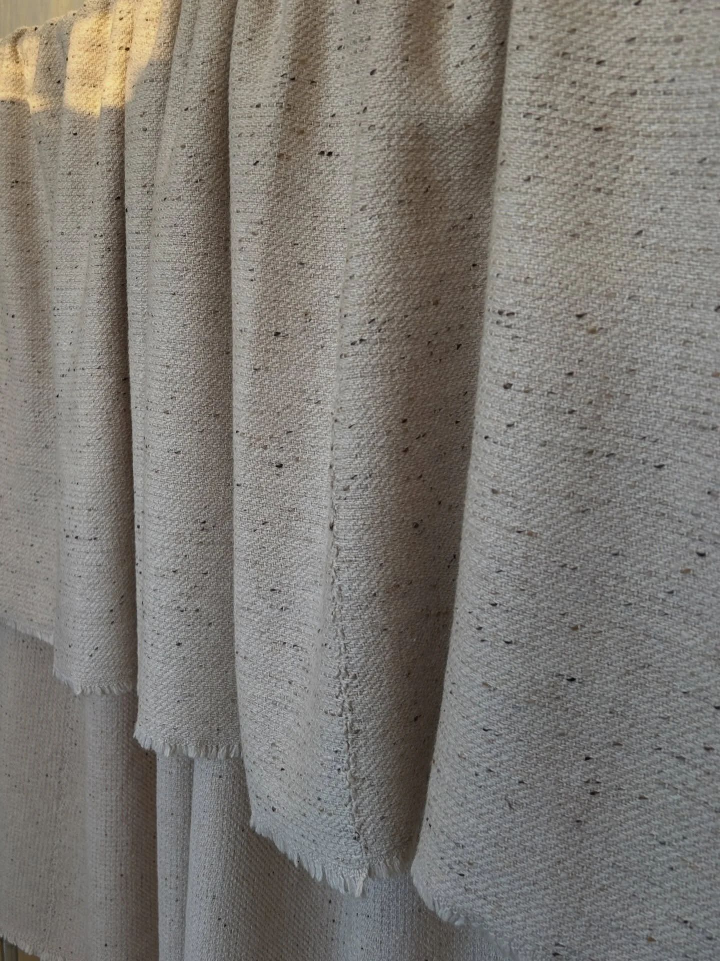 Bespoke Donegal wool bedspread, December 2025

This piece was woven in three full width panels and then hand-stitched together to create a bedspread large enough to drape over the clients emperor-size bed - very pleased with how the joining seams tur