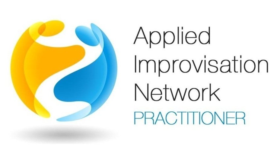 Applied improvisation network badge