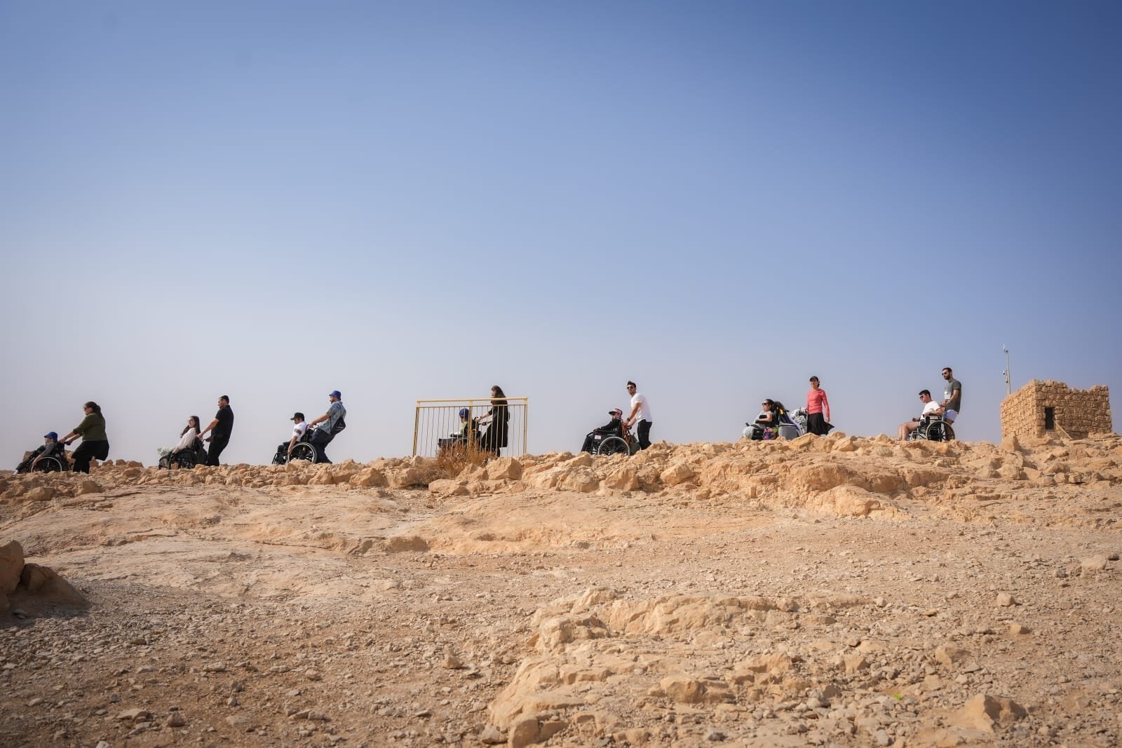 Young Adults in wheelchairs on trip