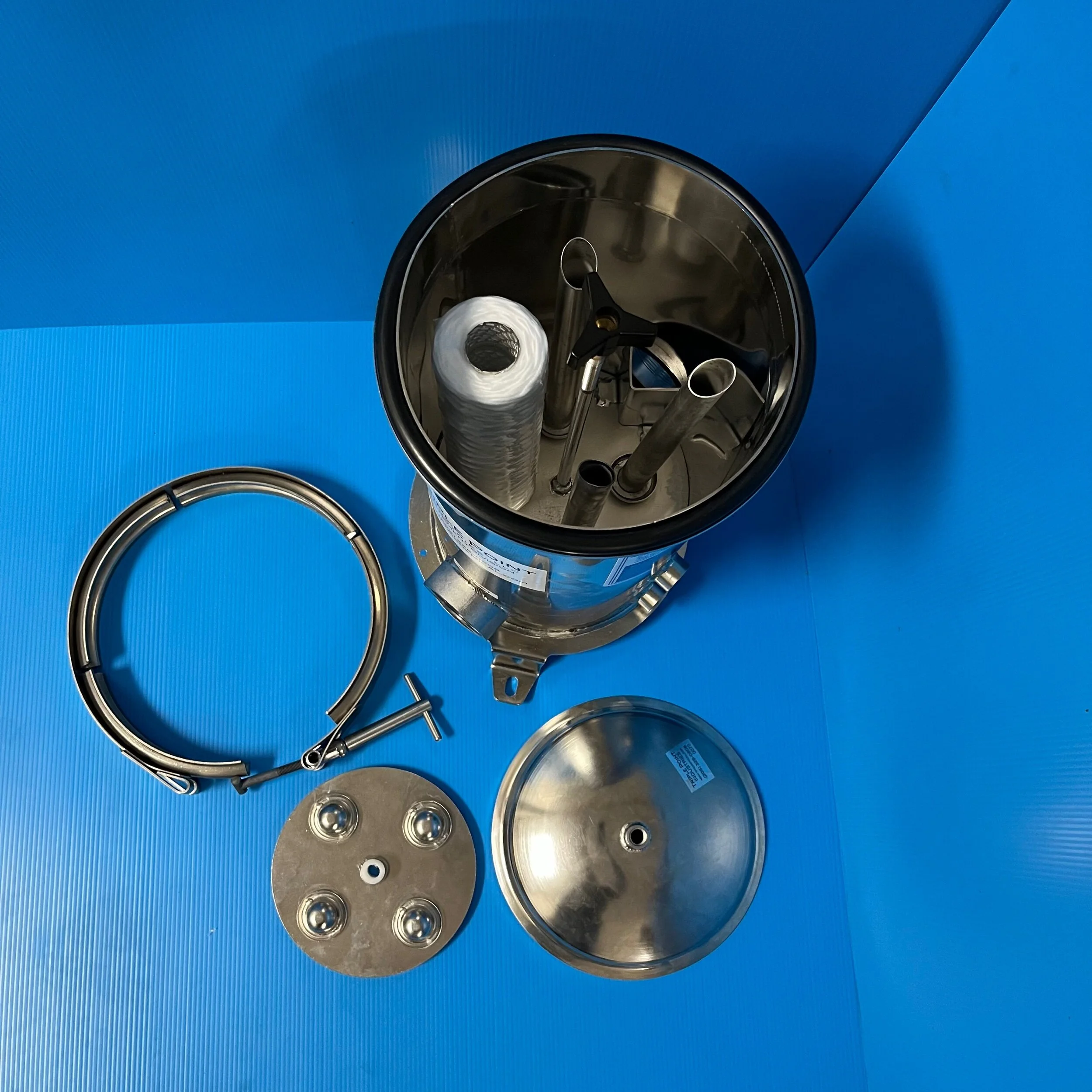 BAND CLAMP FILTER HOUSING — Triple Point Industries, LLC