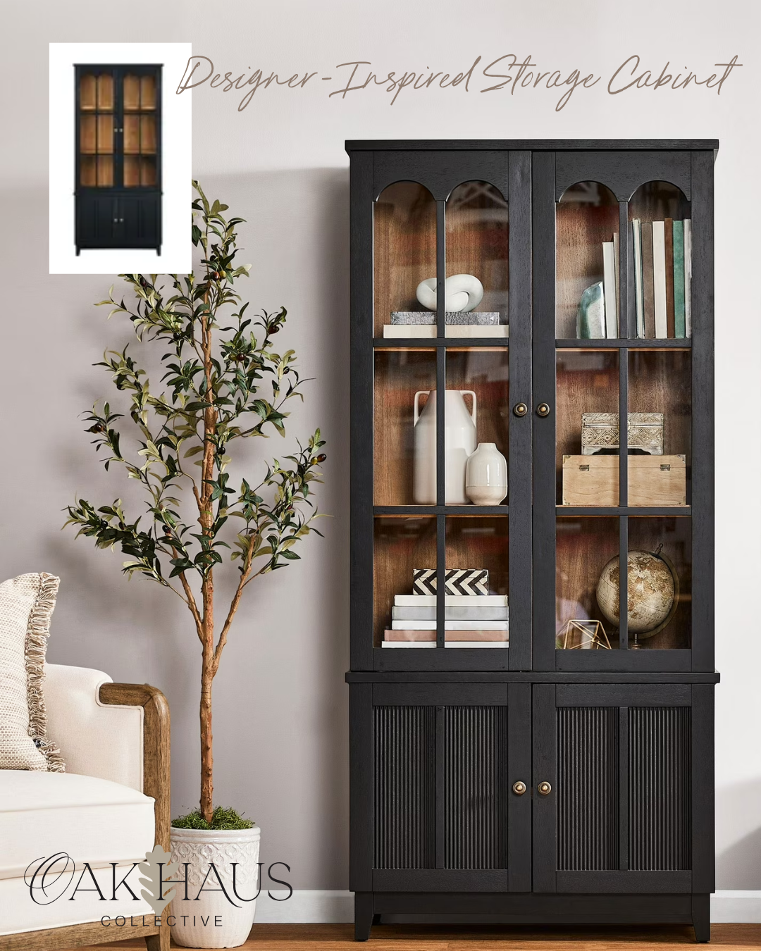 A black, designer-inspired storage cabinet with glass doors, positioned against a light-colored wall, decorated with books and decorative objects inside.