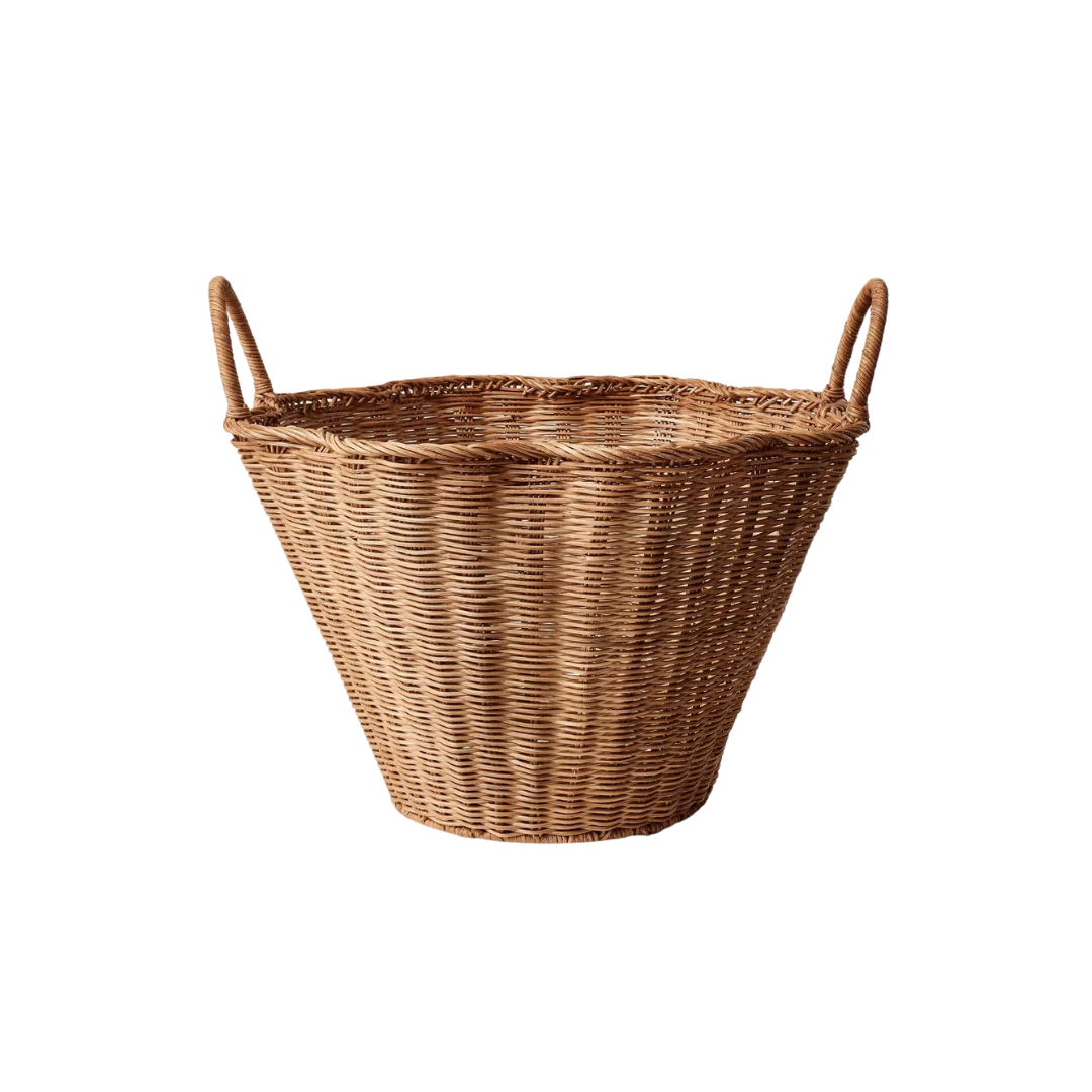 A large woven wicker basket with two handles, isolated on a white background.