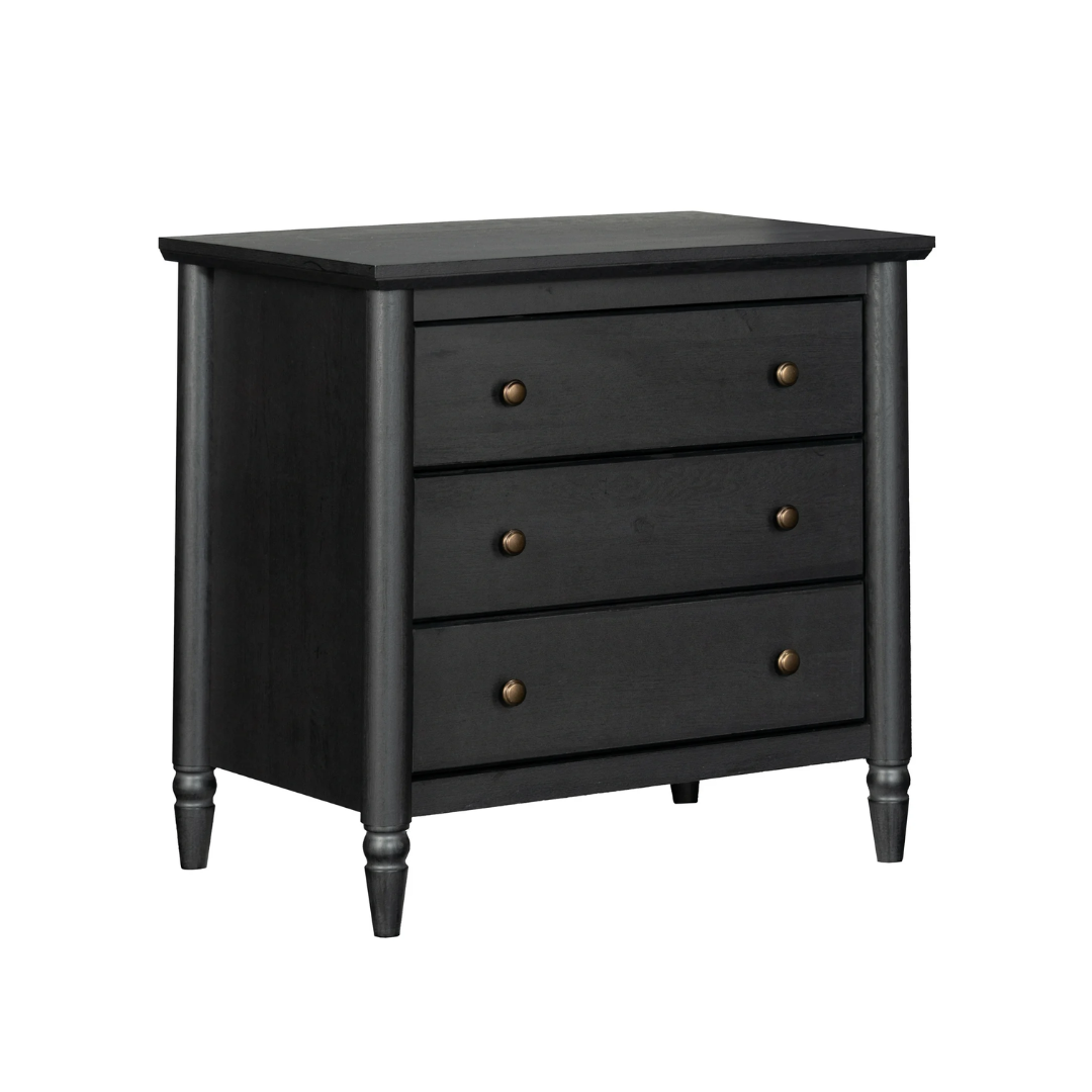 Black wooden dresser with four drawers and brass knobs.