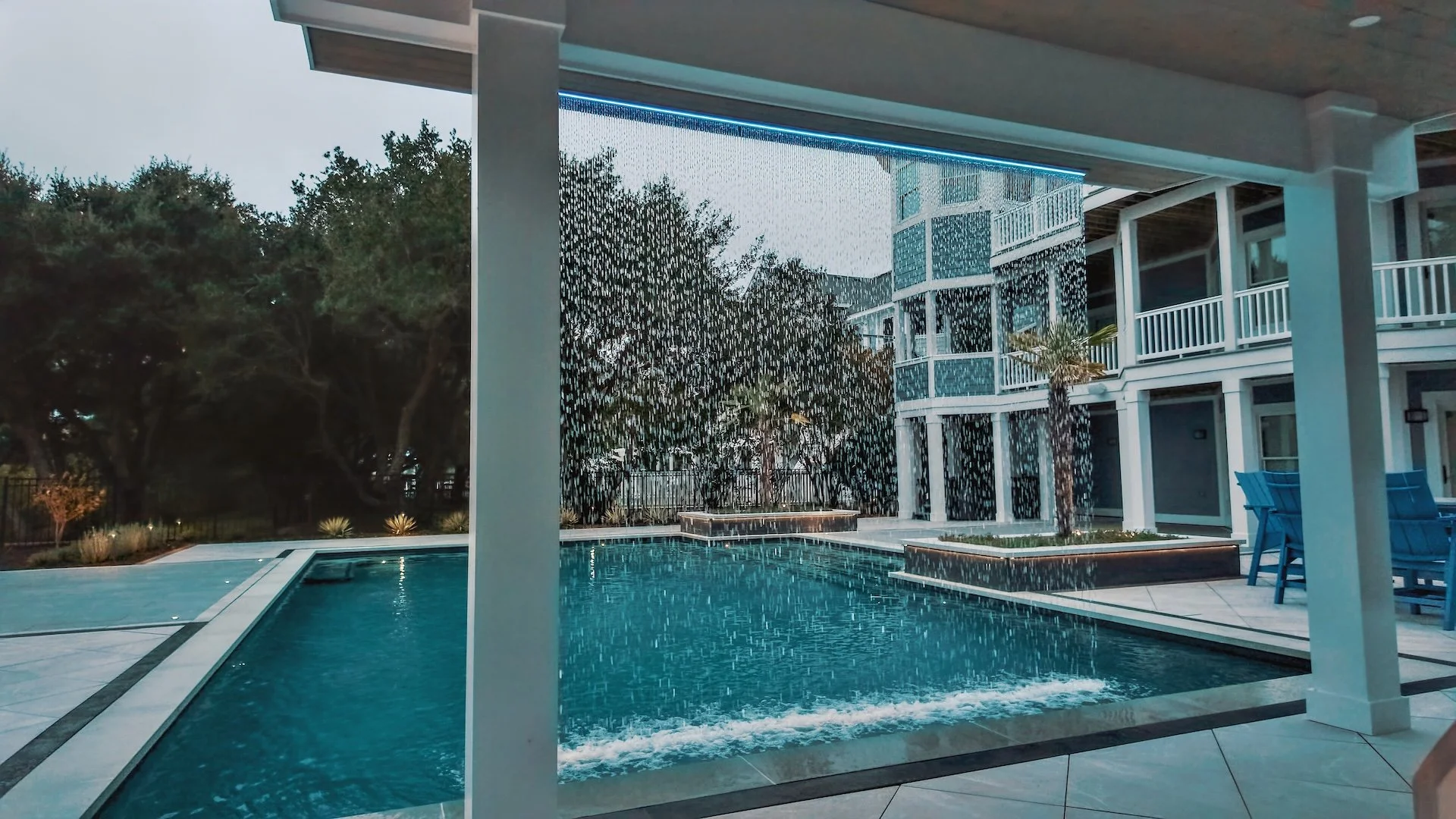 How a Water Feature Contractor Adds Sound and Movement to a Coastal Landscape That Already Has Both