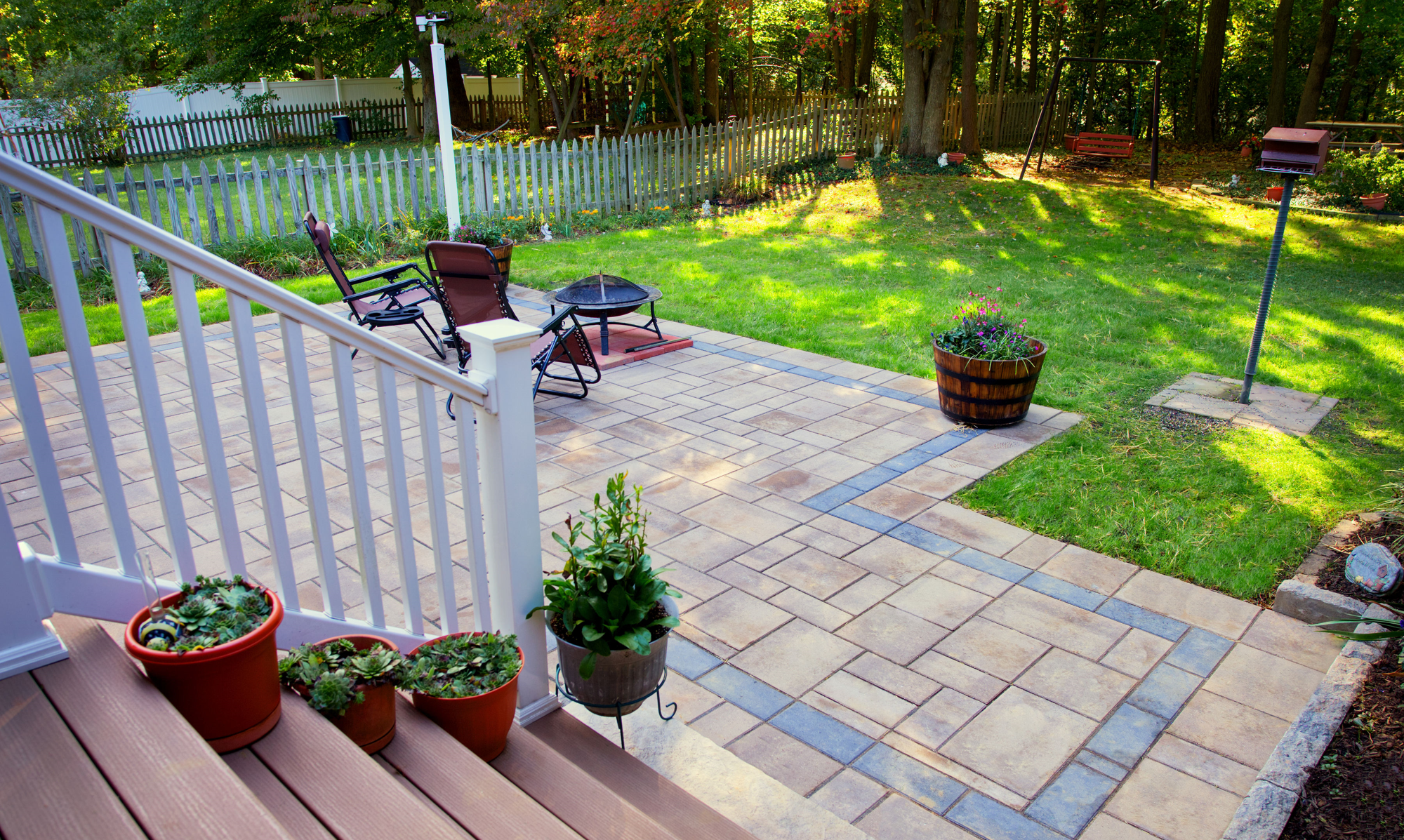 WoodenStairswithWhiteRailing&AngularStonePatio&Backyard.png.png