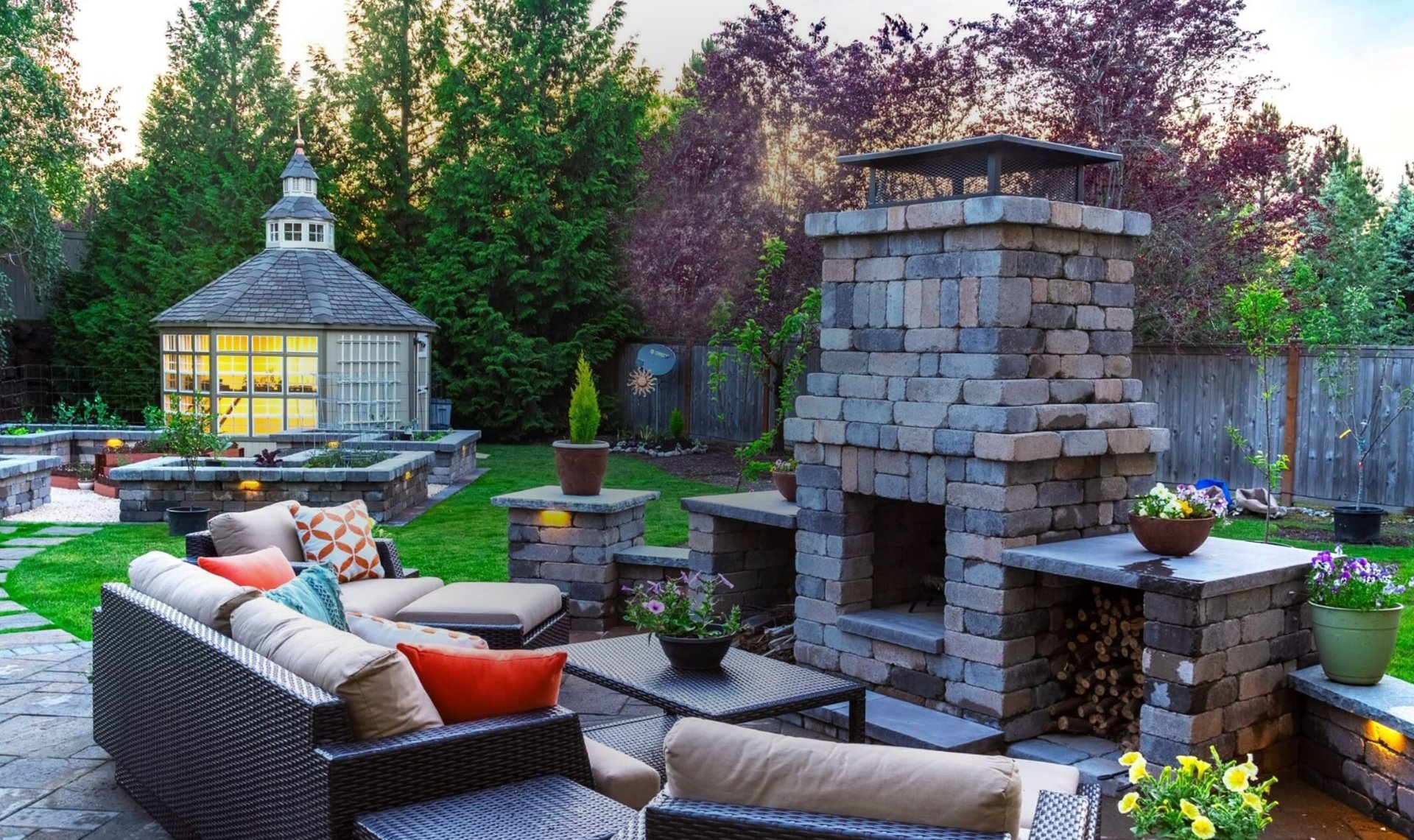 Paver patio with fire pit and outdoor kitchen in Seattle WA