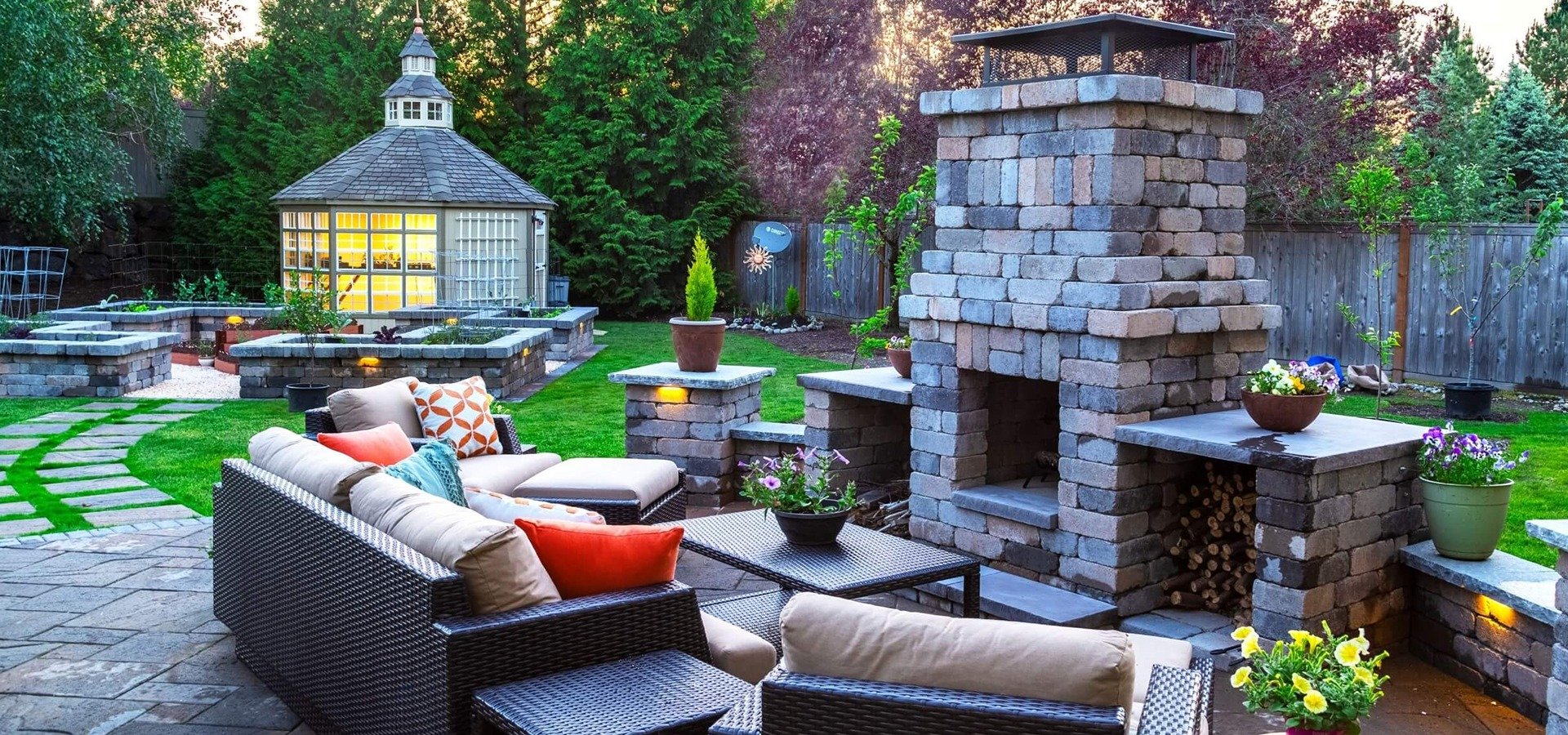 Landscape design, paver patio, fire pit, outdoor kitchen, outdoor lighting in Issaquah WA