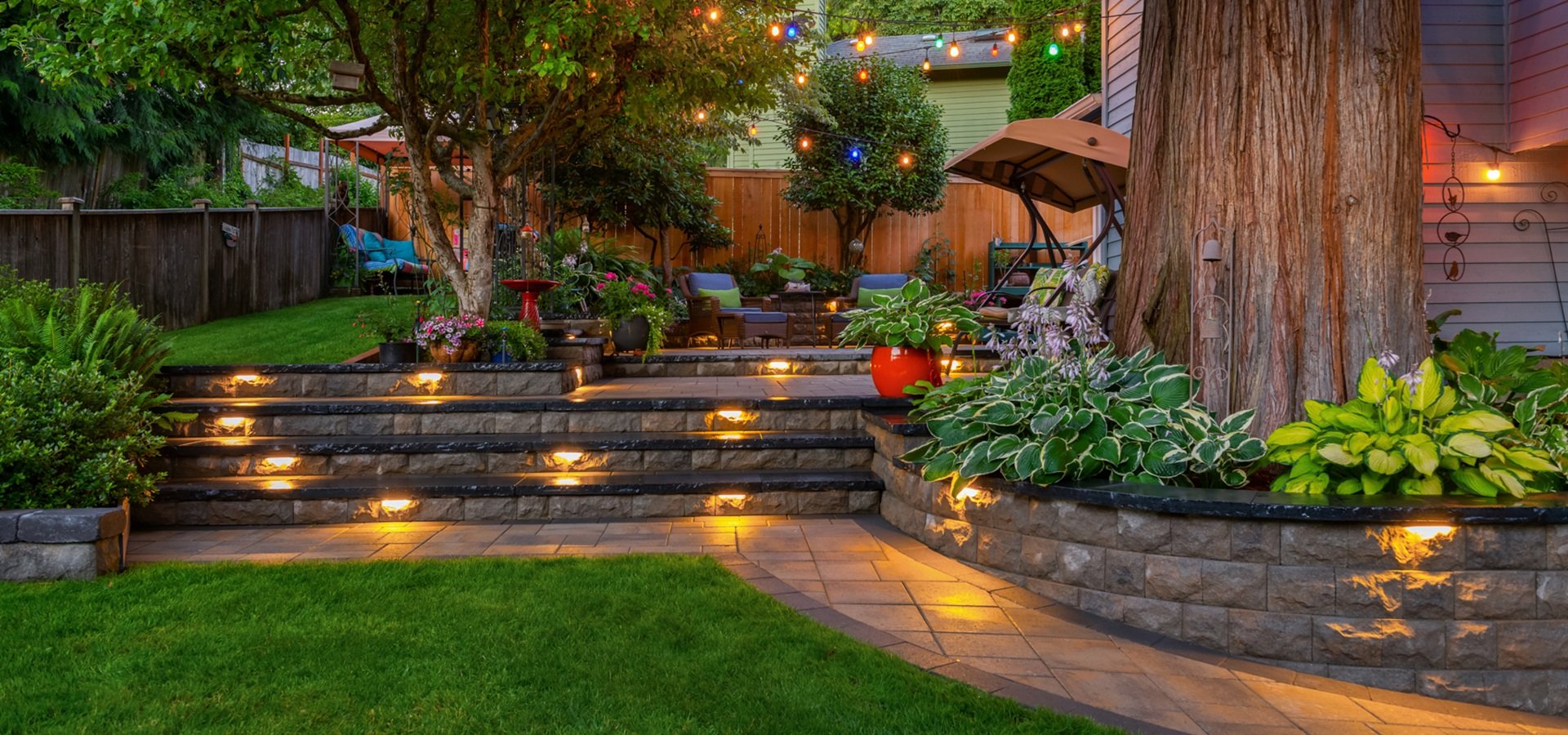 Landscape design, paver patio, outdoor lighting, retaining wall in Mercer Island WA