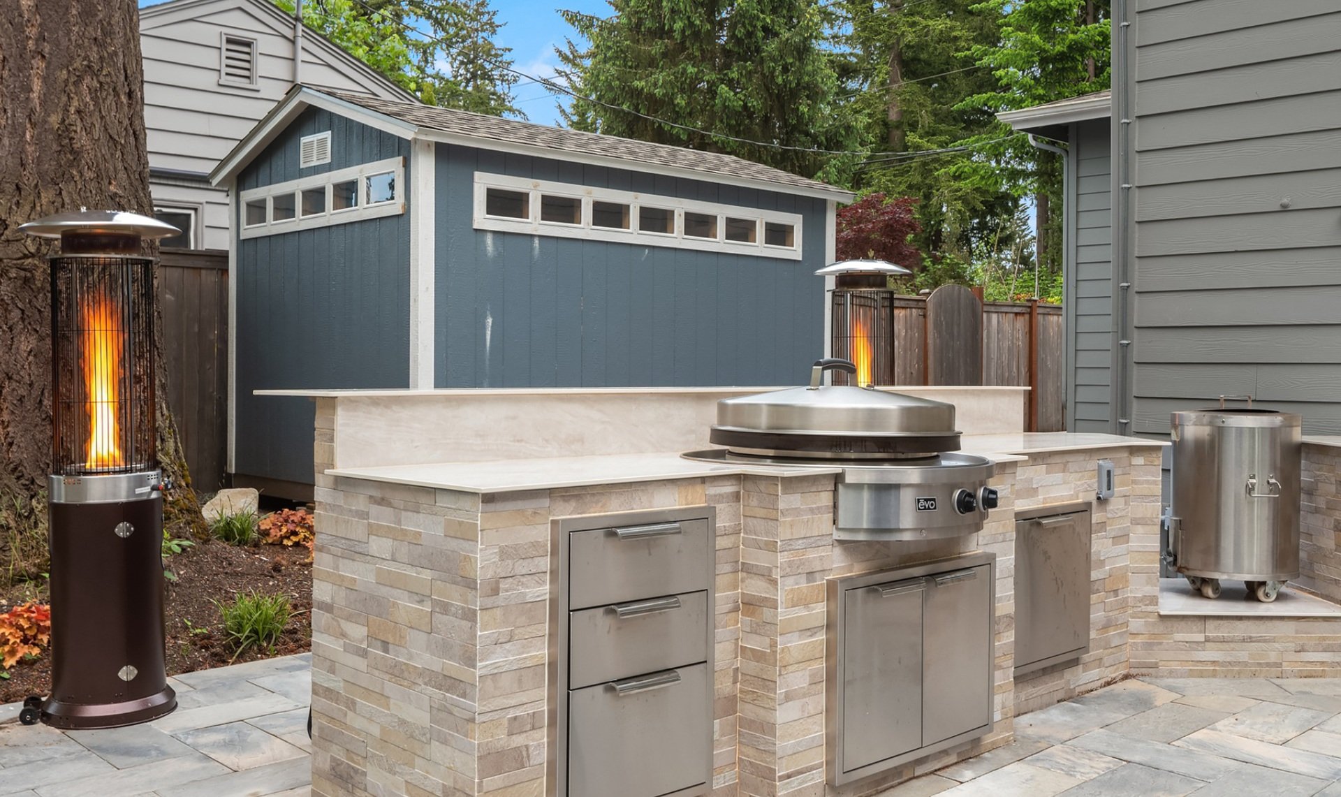 Seattle, WA landscape design, paver patio, pergola, artificial turf, outdoor kitchen, outdoor lighting