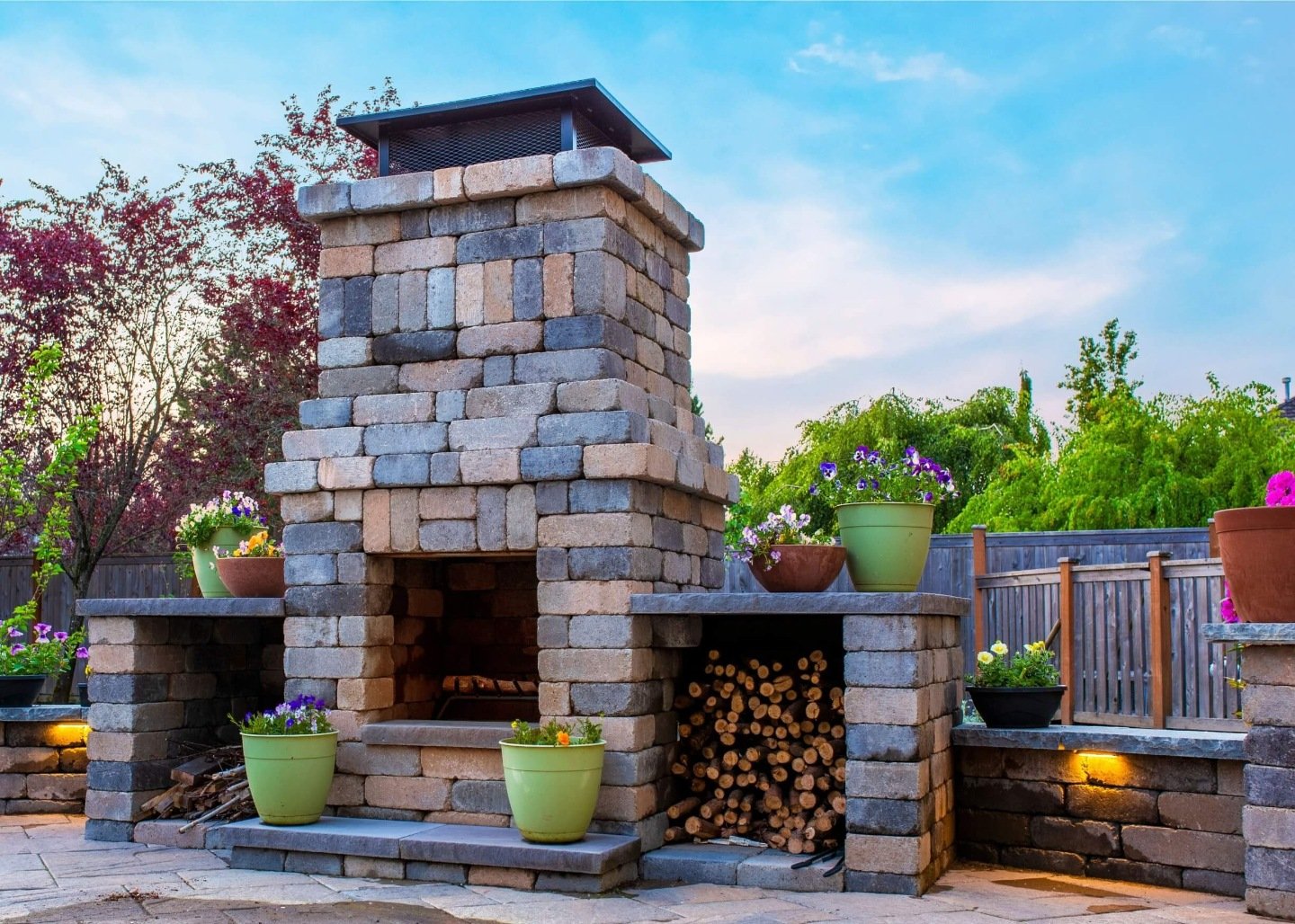 Beautiful outdoor fireplace, paver patio and fire pit in Redmond WA