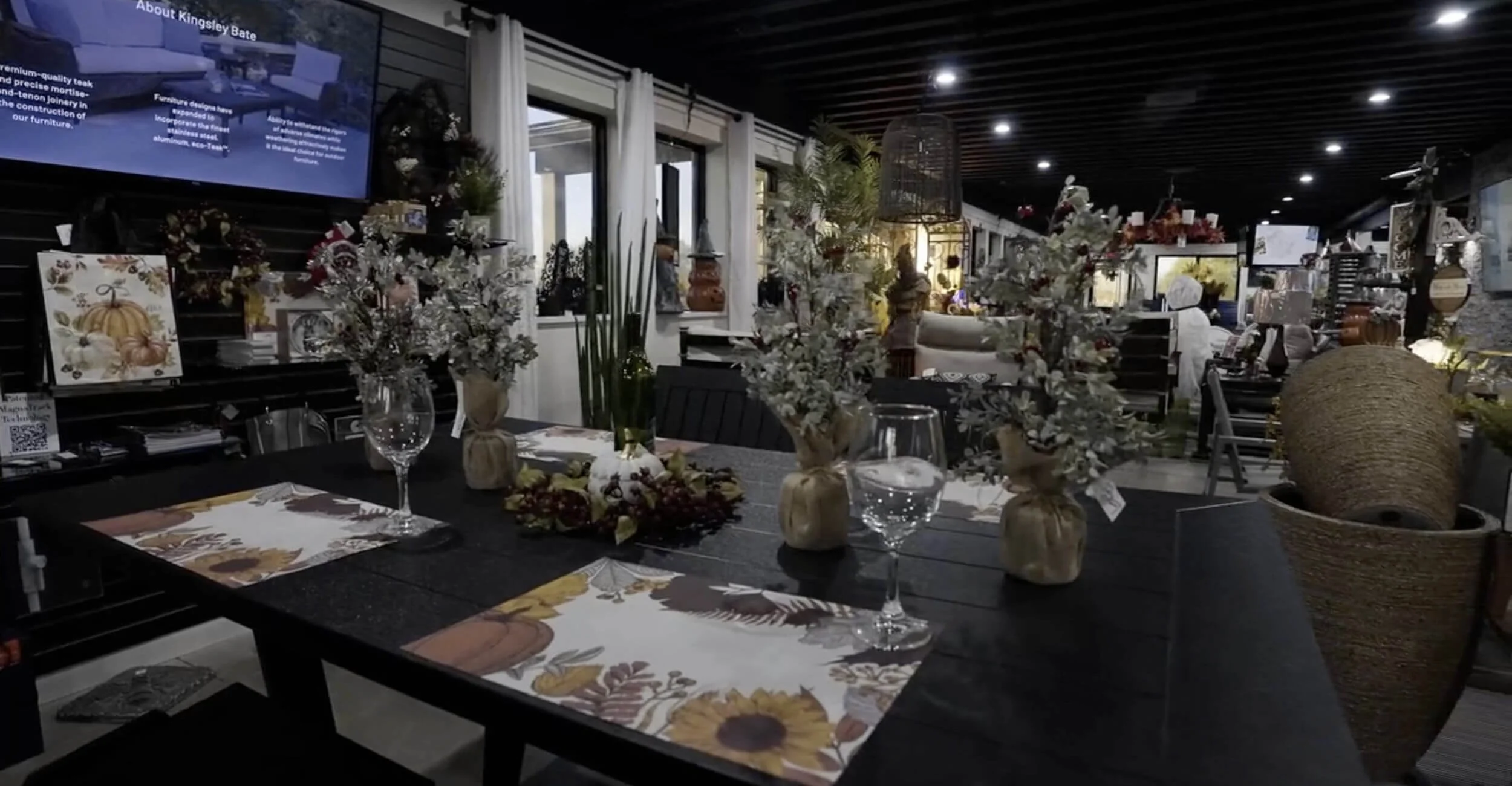 Outdoor dining table display inside the outdoor living showroom in Troy, Shelby Township, and Rochester Hills, MI