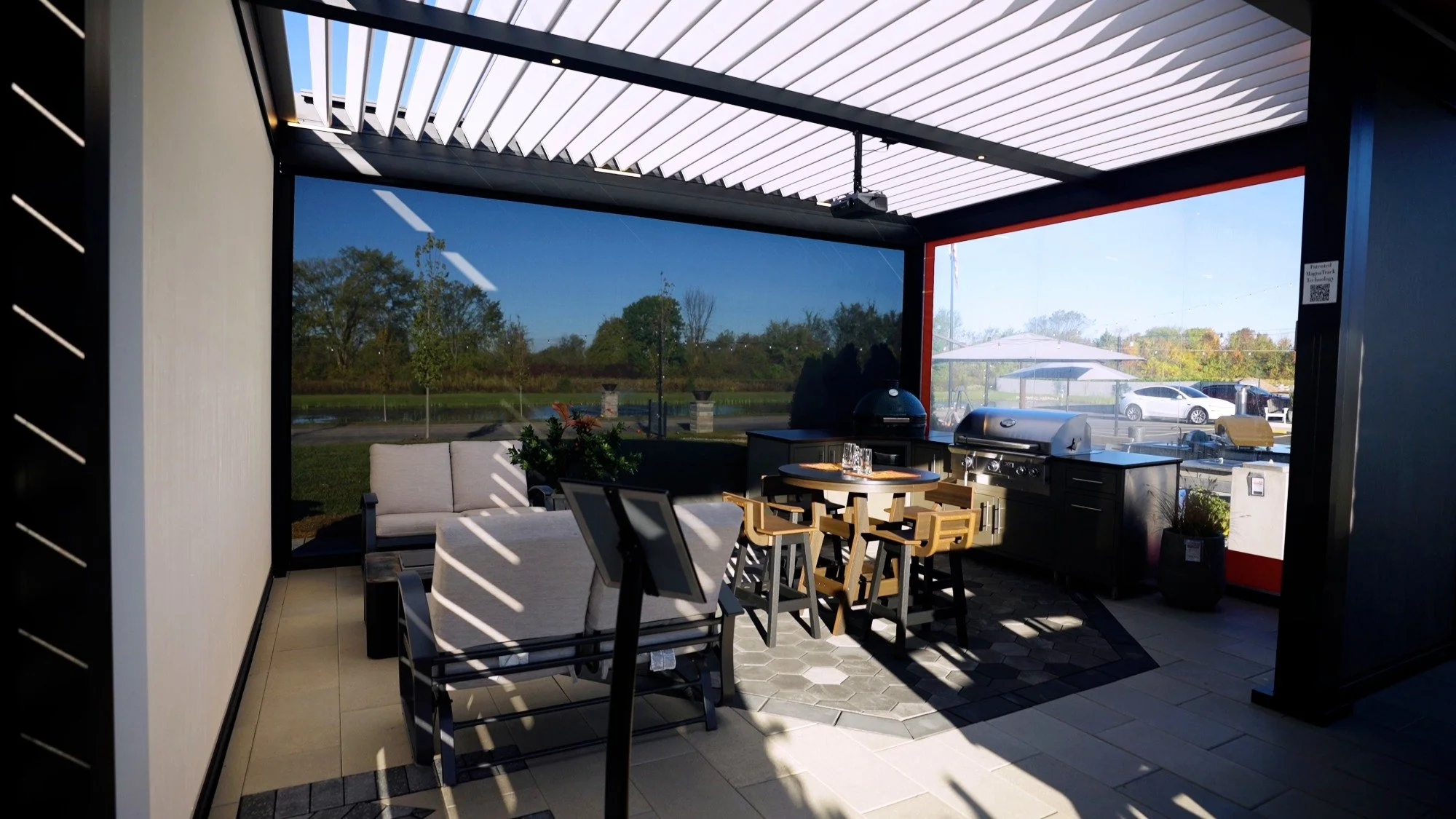 Modern covered patio with dining area and slatted roof structure