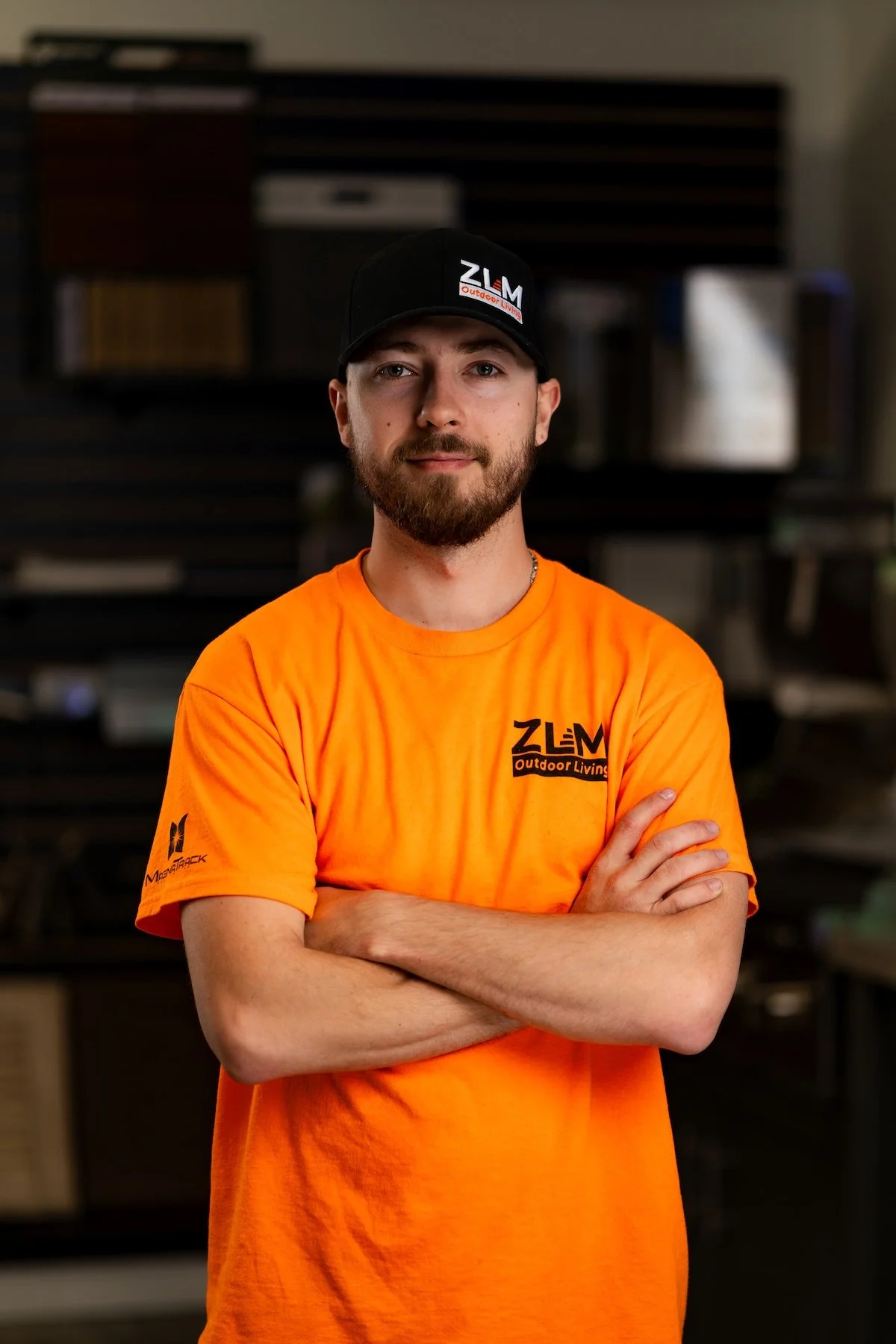 Young man in orange ZLM t-shirt