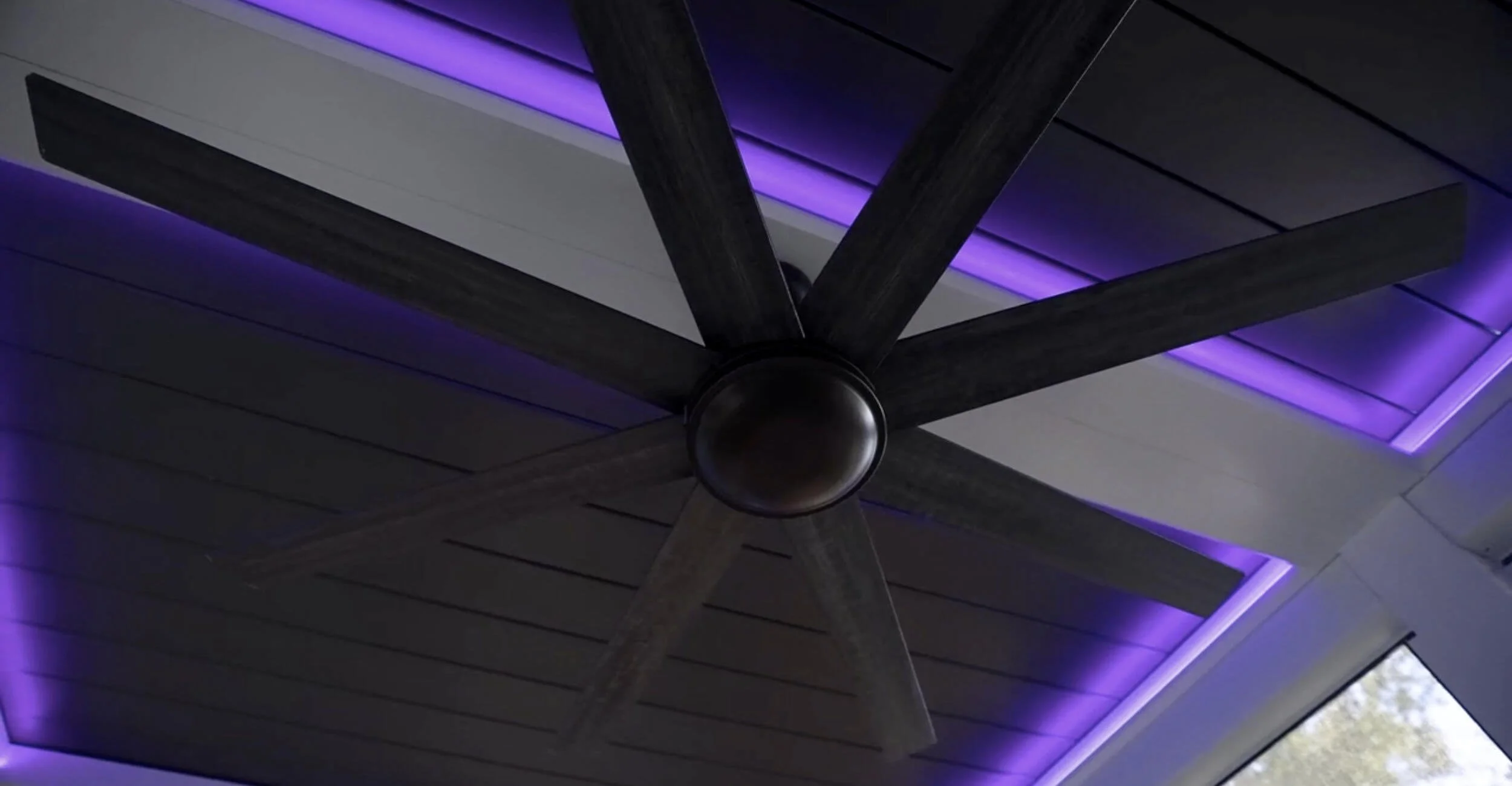 Custom cedar pavilion showcasing three season outdoor living in Troy, Shelby Township, and Rochester Hills, MI with integrated lighting and ceiling fan