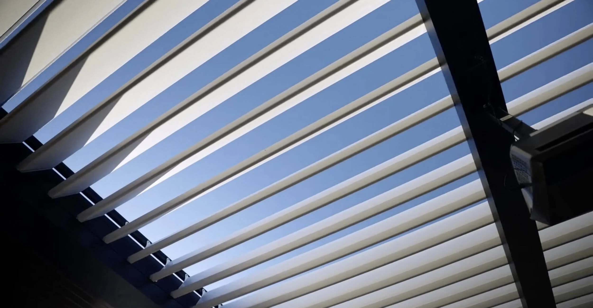 Slatted all season roof display at the outdoor living showroom in Troy, Shelby Township, and Rochester Hills, MI