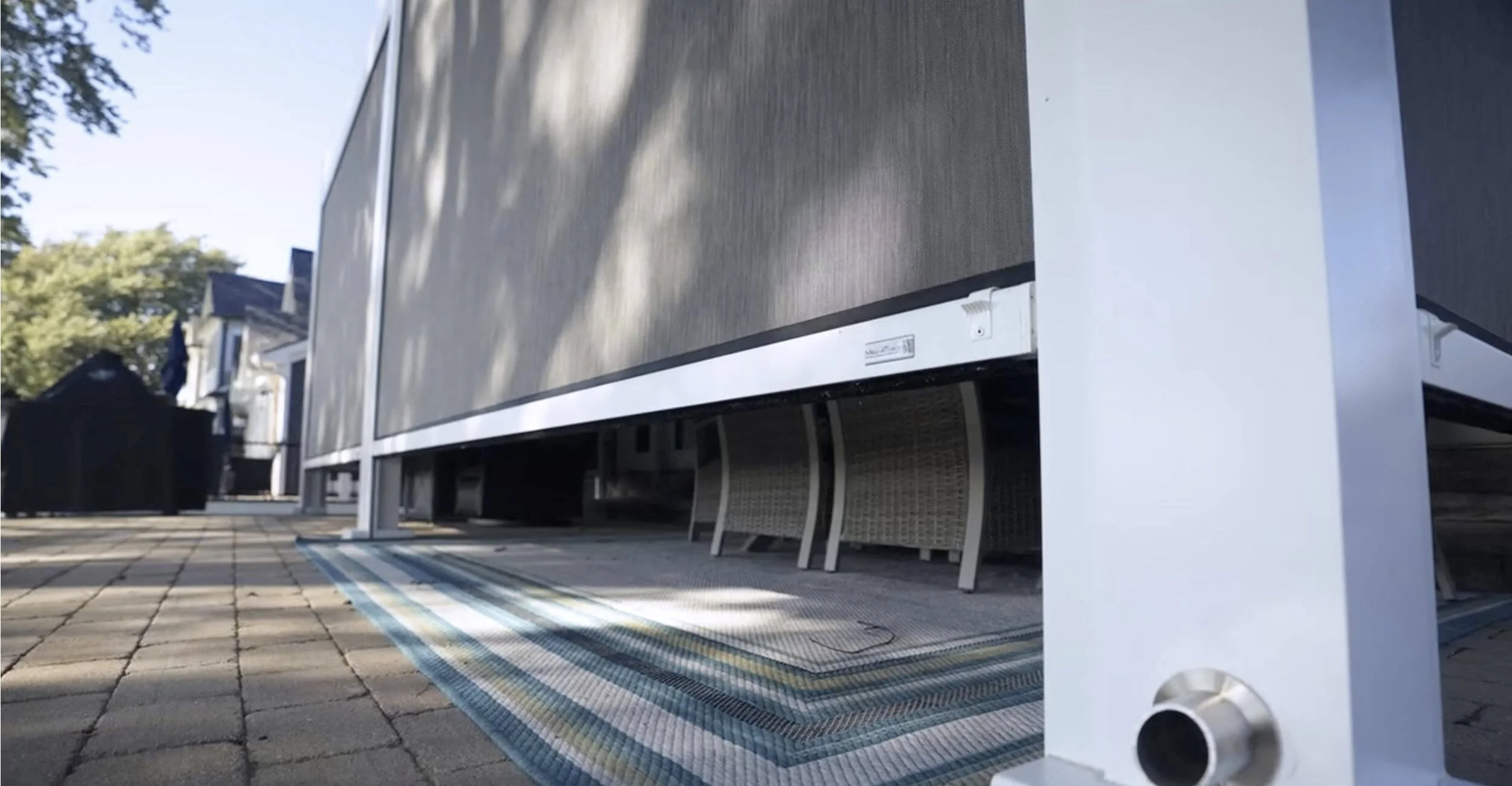 Retractable screen system enhancing three season outdoor living in Troy, Shelby Township, and Rochester Hills, MI for added comfort