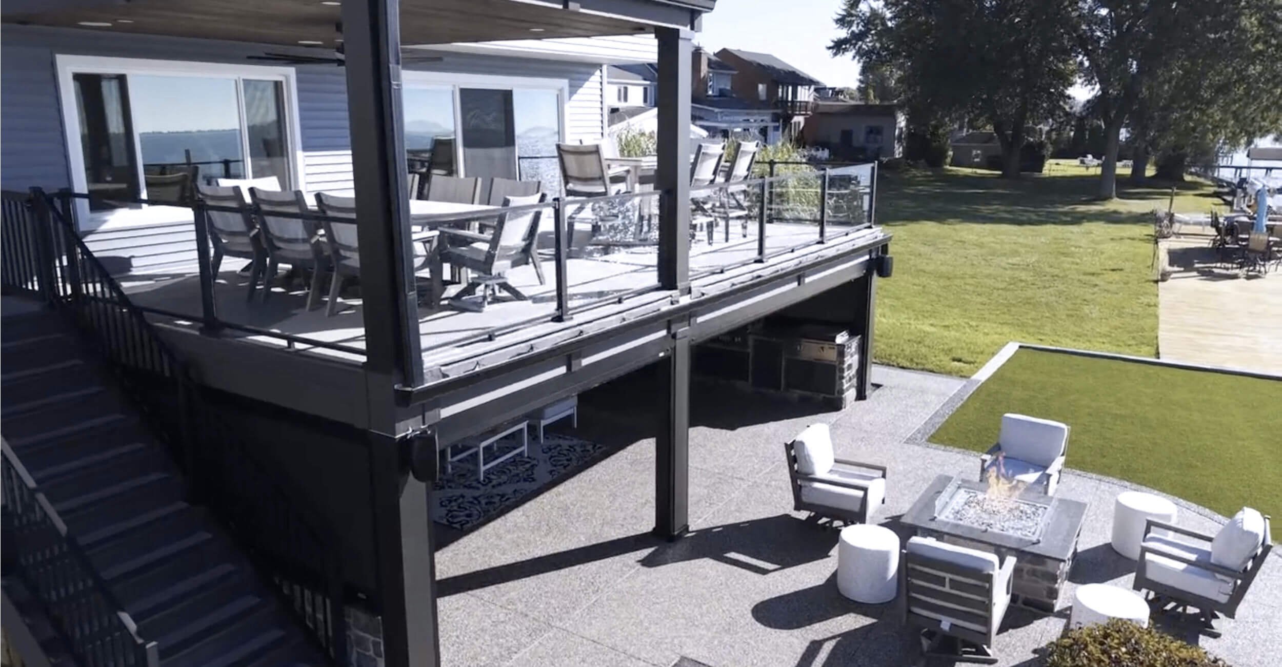 Lakeside landscaping plan supporting premium backyard oasis design in Troy, Shelby Township, and Rochester Hills, MI with native greenery