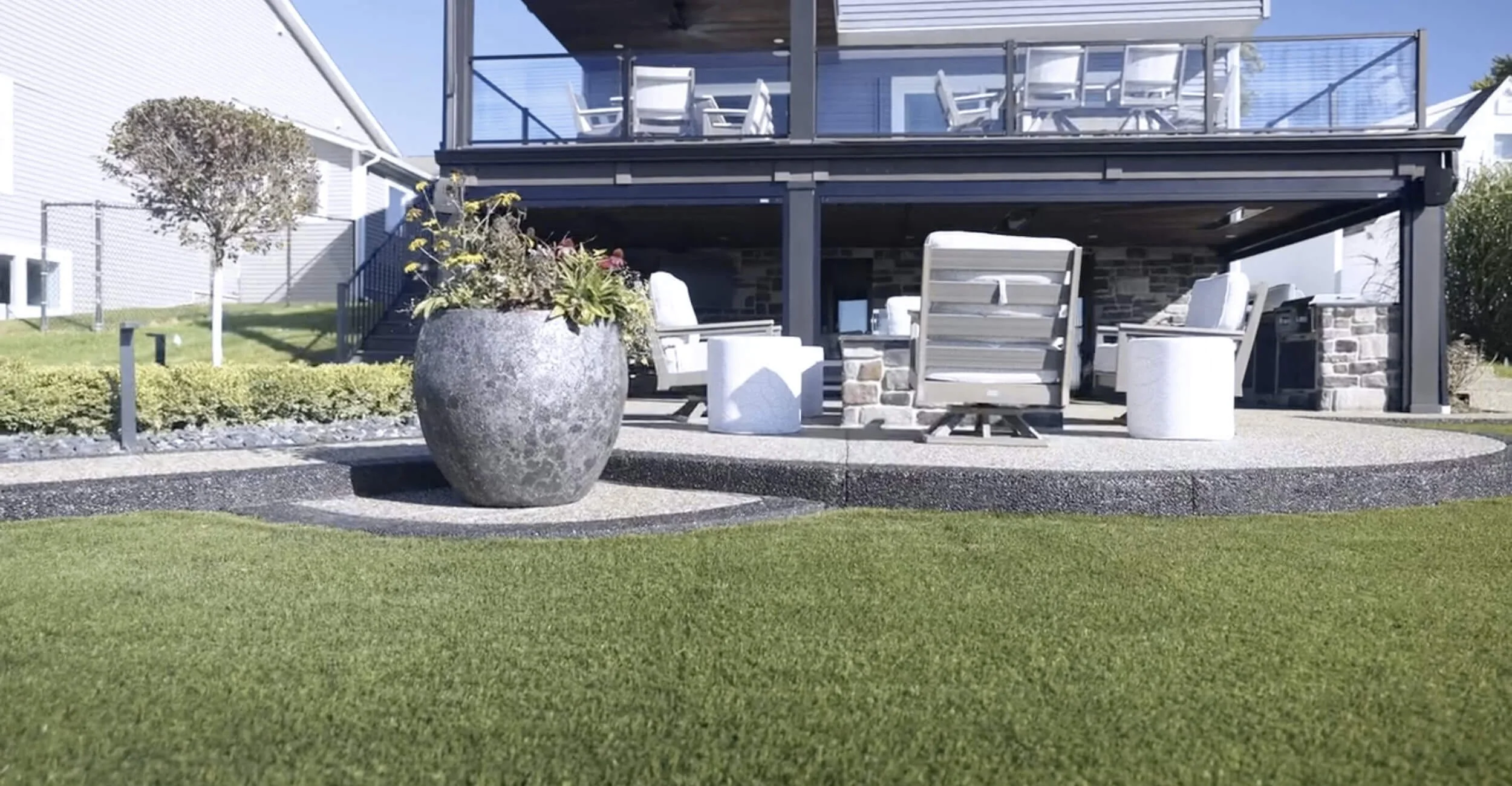 Complete waterfront landscape renovation centered on intentional backyard oasis design in Troy, Shelby Township, and Rochester Hills, MI