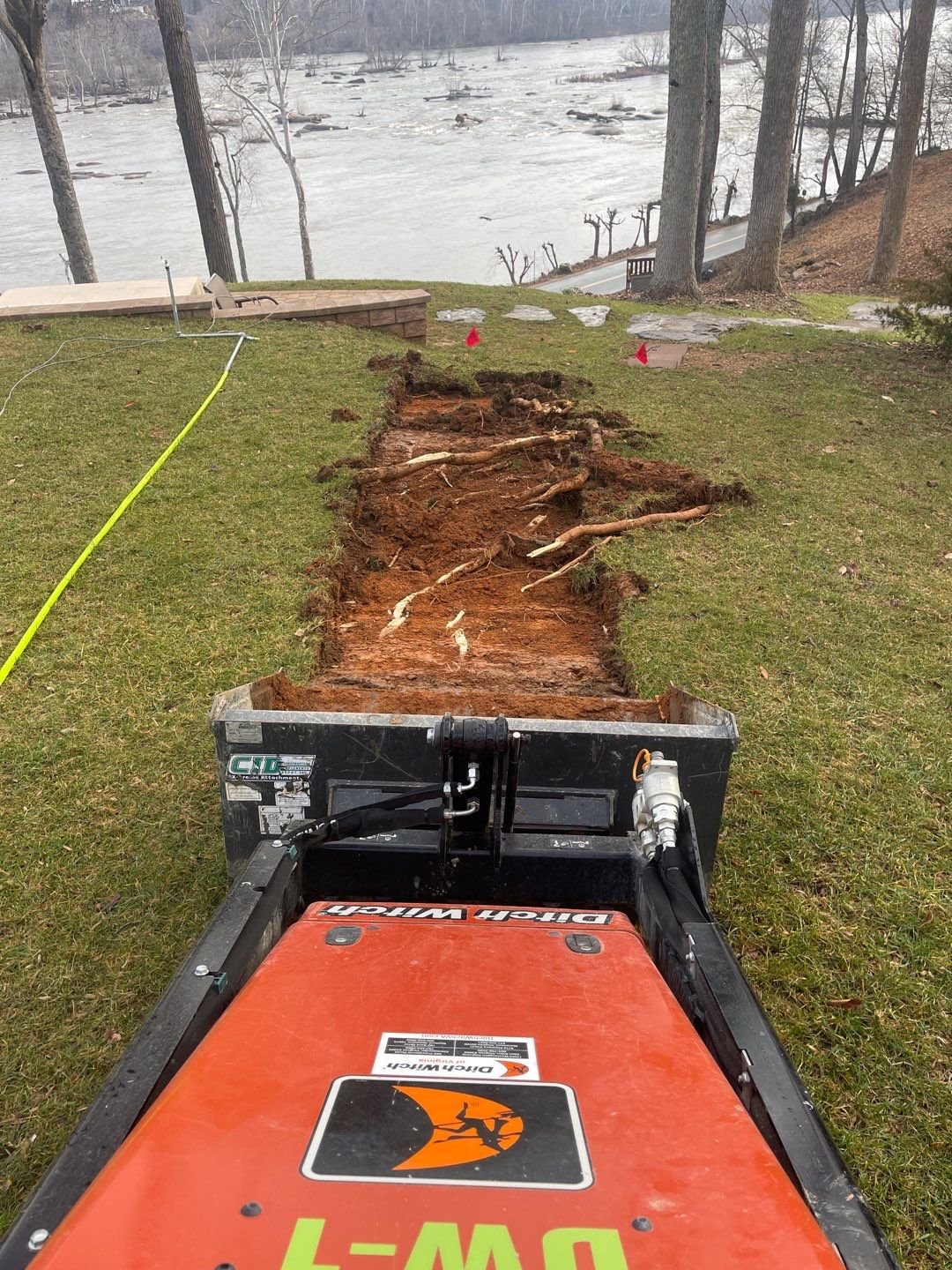 In Progress - Bobcat Clearing the Path.jpg