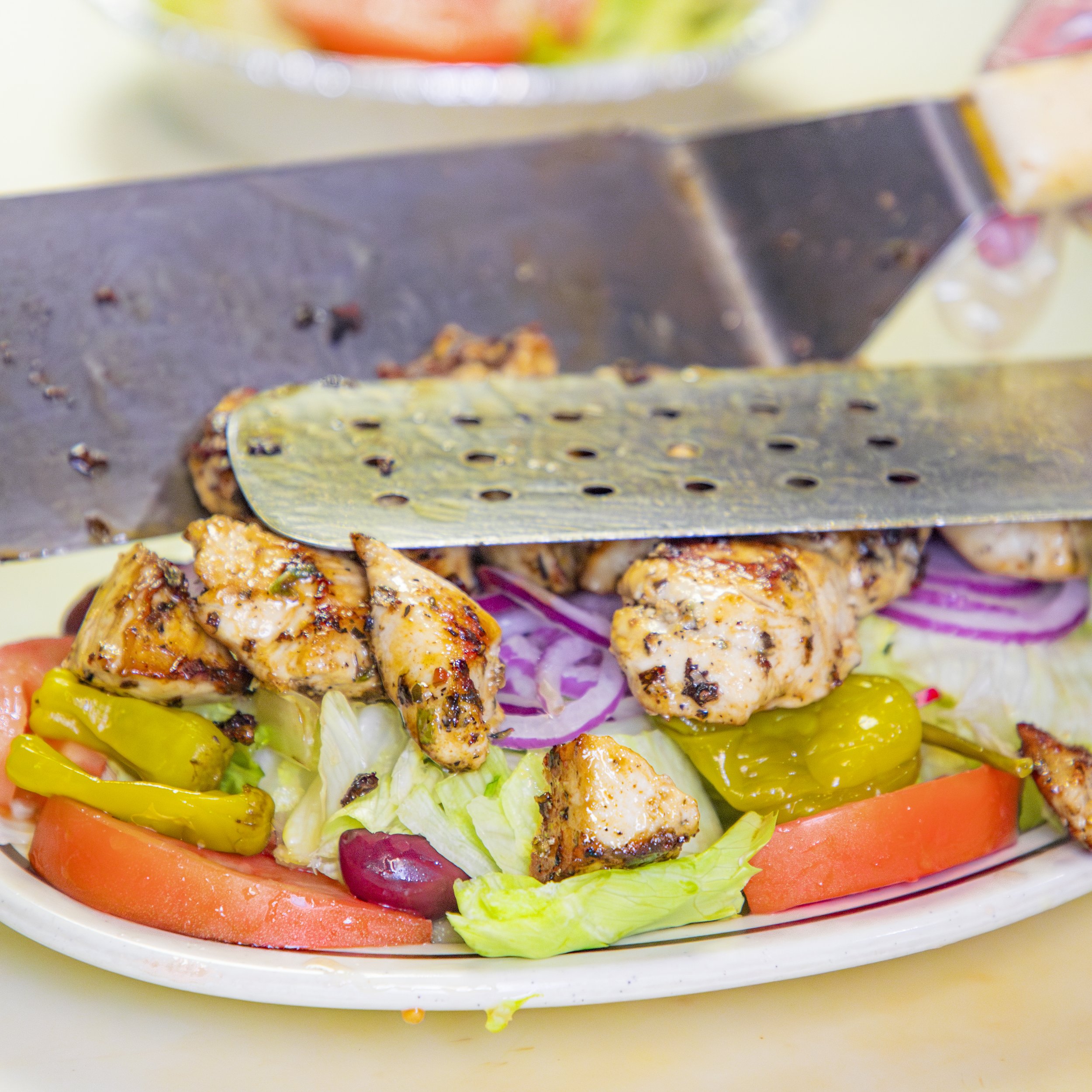 Tossed Salad (tomato, olives, pepper, onion) adding chicken 02.jpg