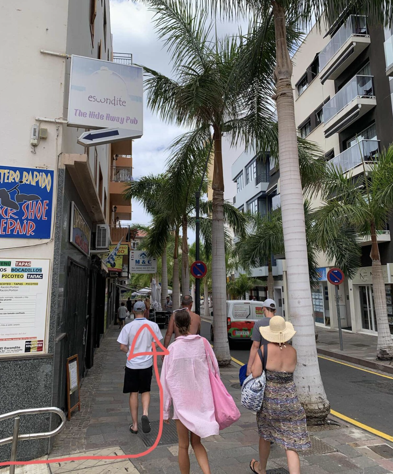 3) Now you can go to the studio.

The building entrance is located in front of the church in Los Cristianos. Follow this street until you reach Edificio La Gavota, Av. Los Playeros 27.