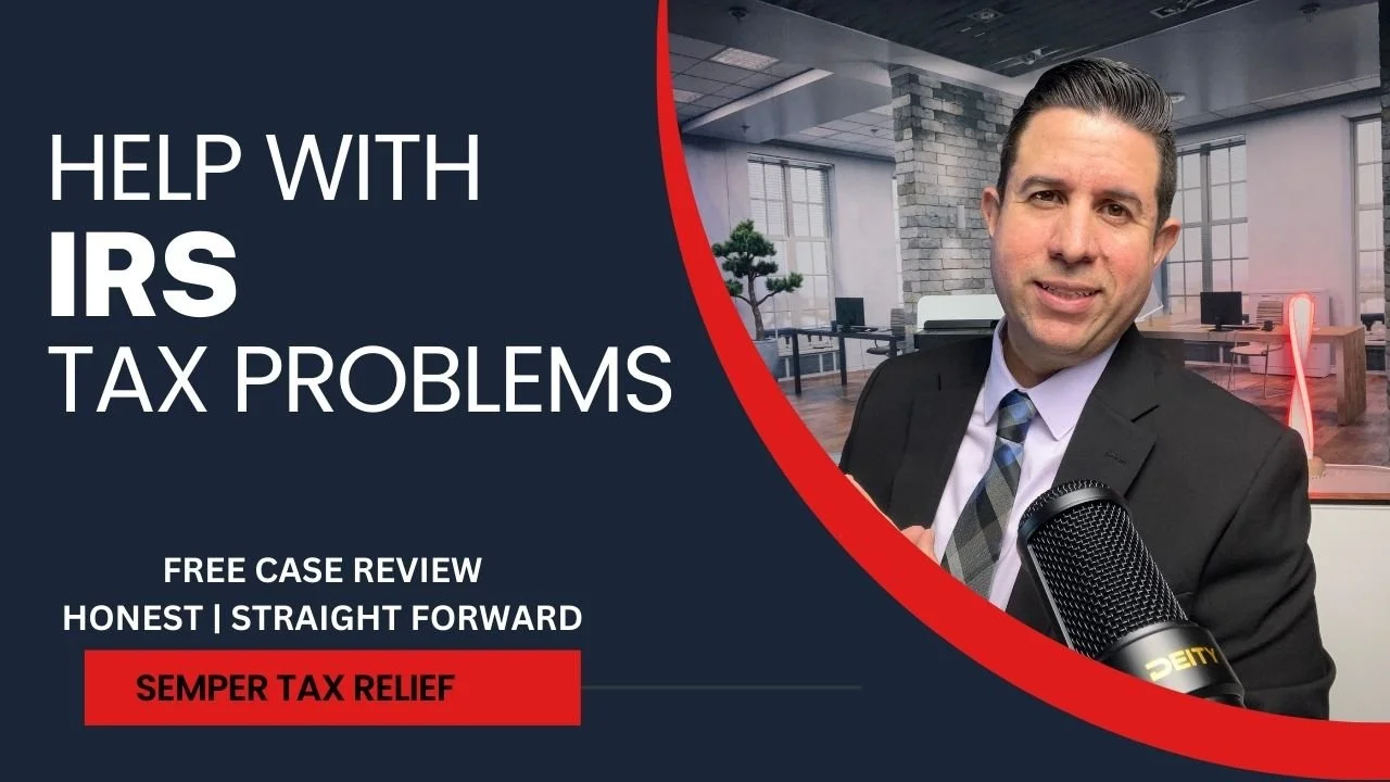 A man in a suit and tie smiling in an office setting with large windows, a microphone in front of him, and a digital banner on the left side advertising help with IRS tax problems.