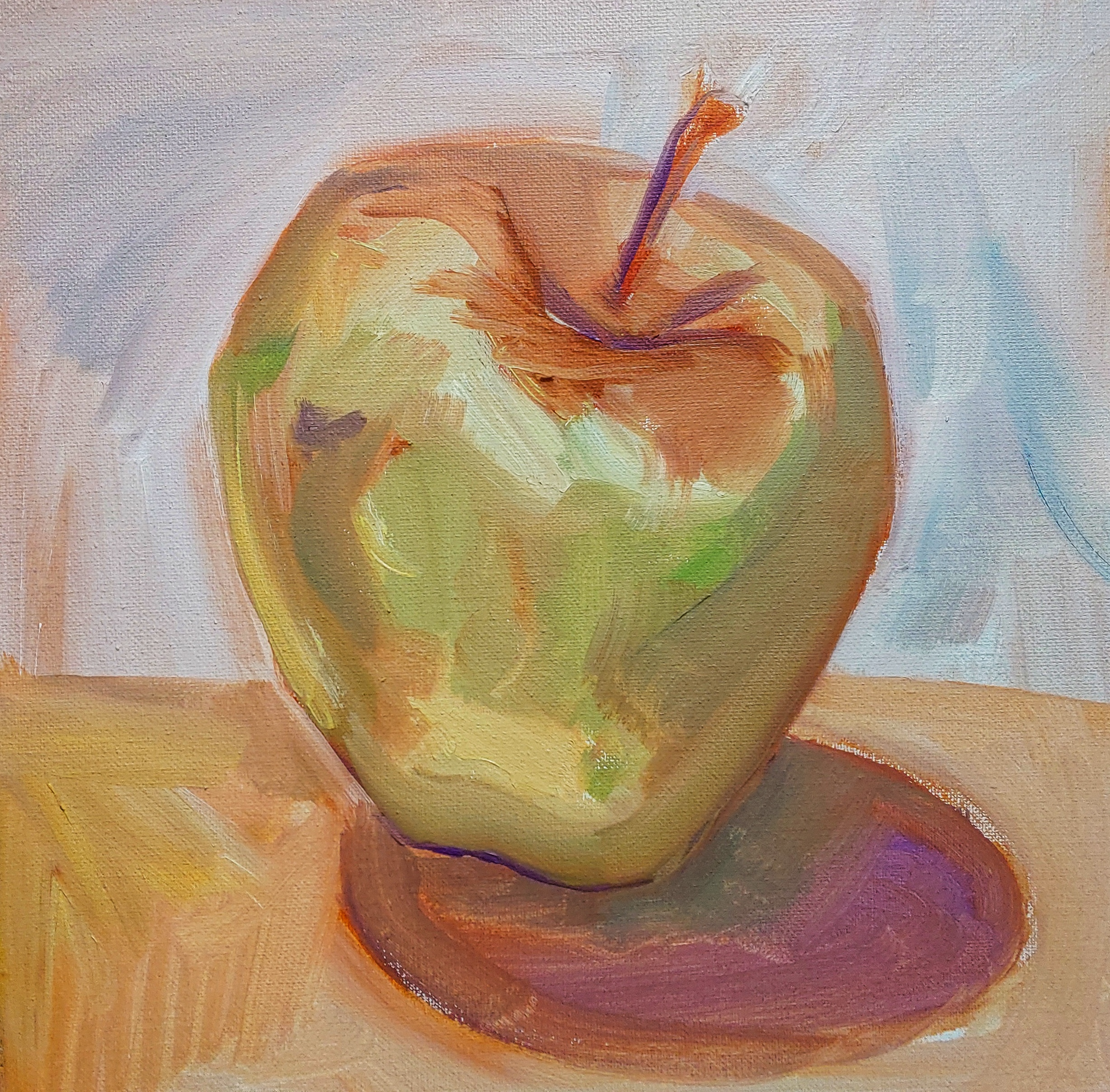 Painting of a green apple with a bite taken out and a small piece of the stem attached, sitting on a wooden surface.