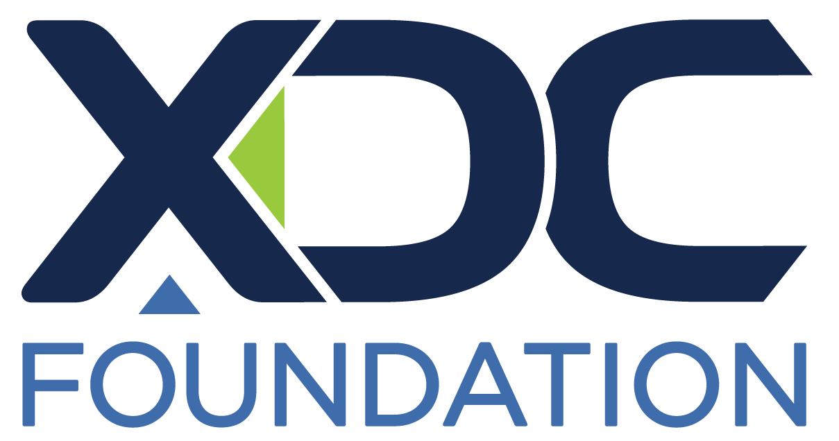 XDC Foundation logo with stylized letters X, D, and C in dark blue, green, and light blue, with the word 'FOUNDATION' below in blue.