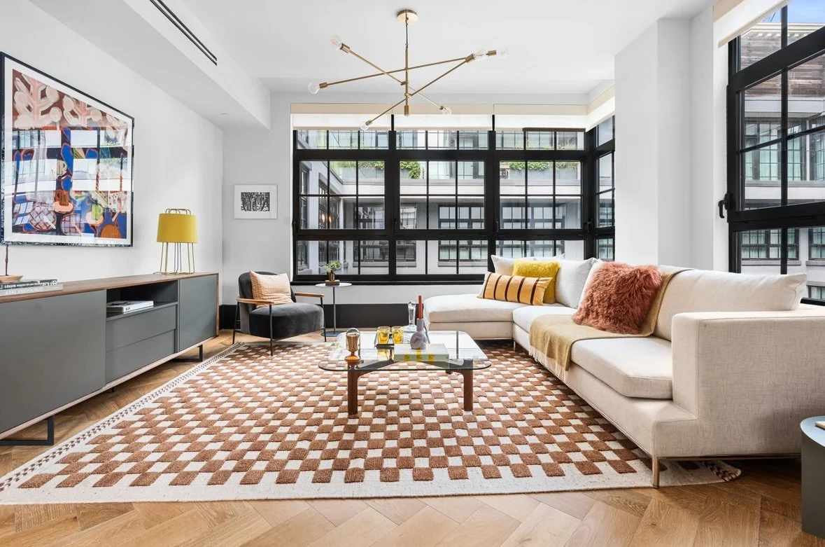 A Reason to Stay&hellip; Inside!! 

Staging helps buyers envision the coziest of cold nights inside their future home.

Large area rugs not only ground the space, but also add warmth and depth. We love using textured graphic rugs that pop in photogra