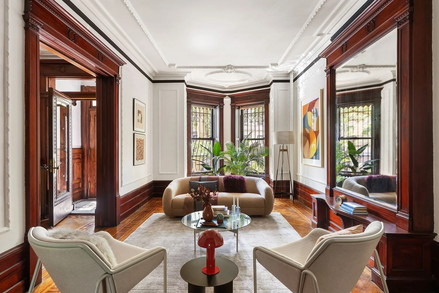 Formal living room with high end finishes and art