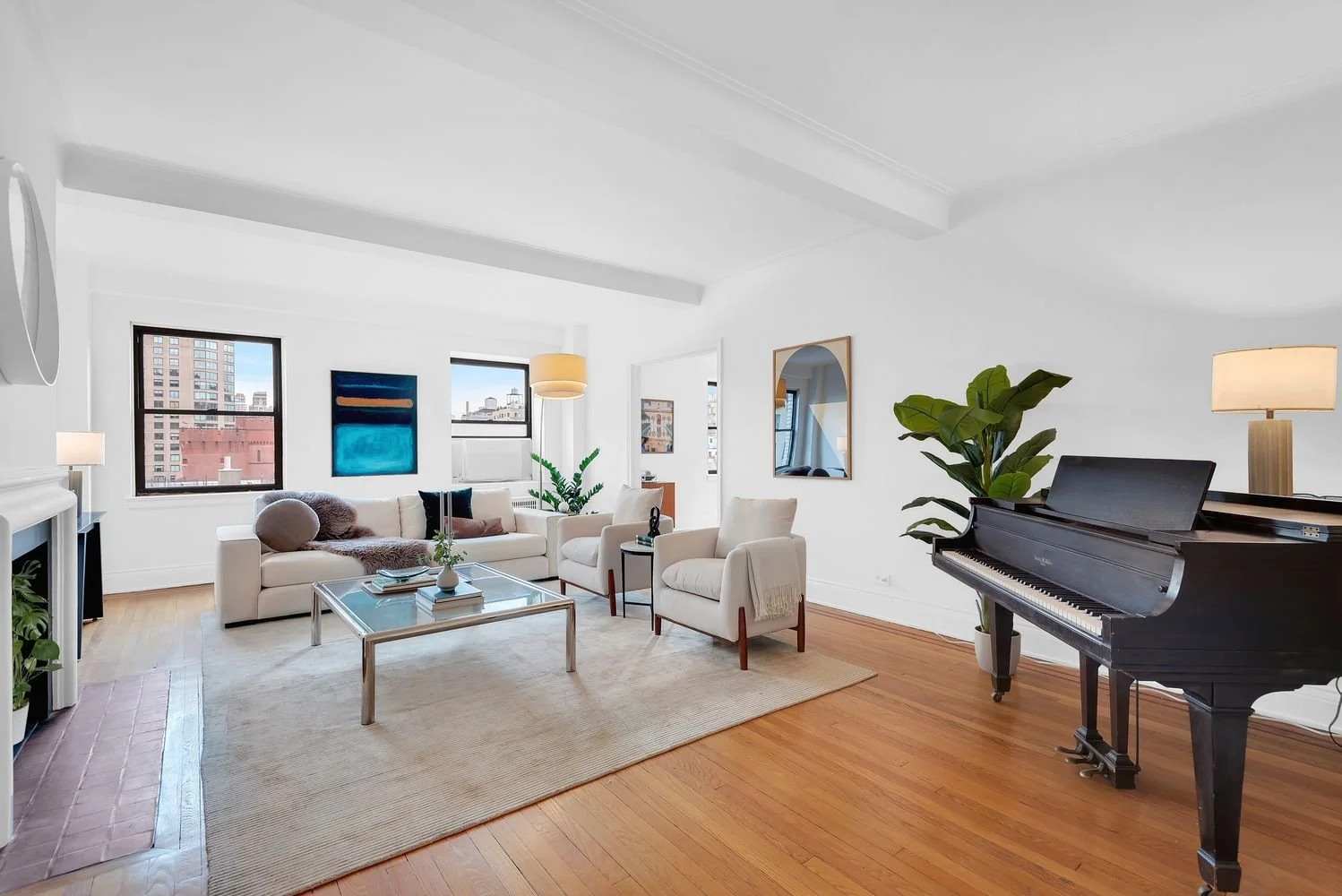 Architecturally interested living room with piano and seating area