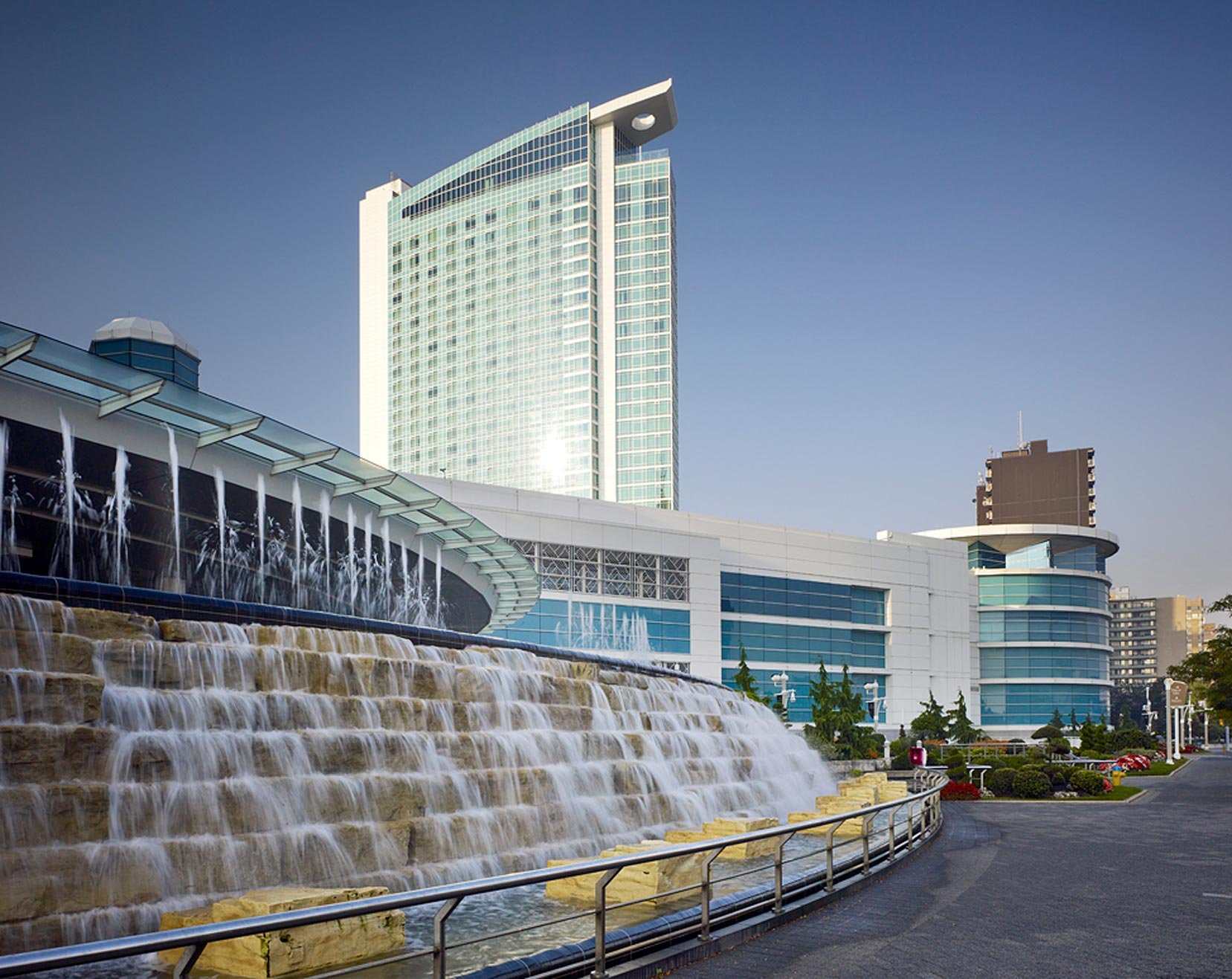 WZMH-Architects-Caesars-Casino-Exterior-View-With-Waterfall-Windsor.jpg
