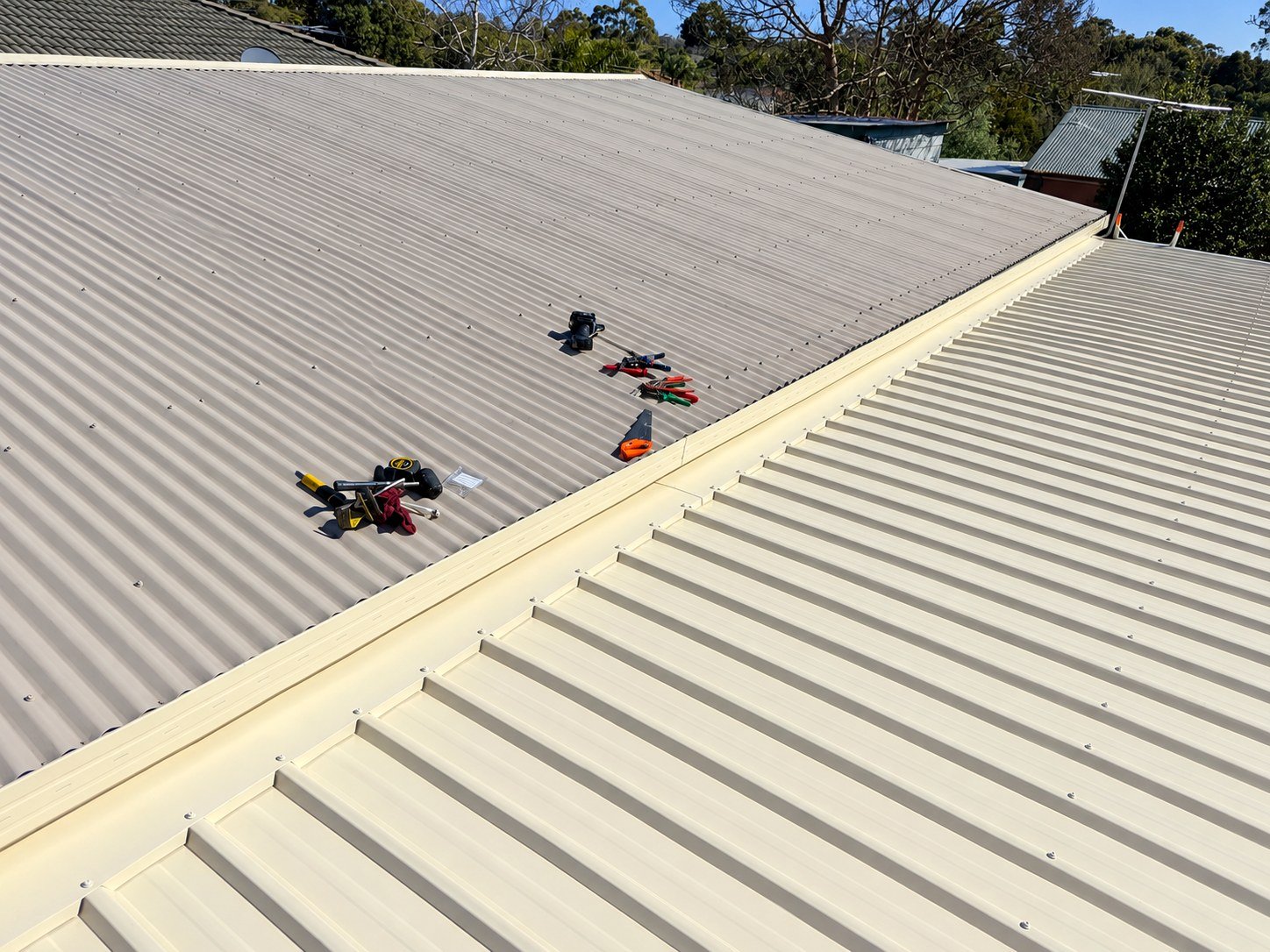 Langwarrin pergola: new flashings and gutter where it meets the main roof