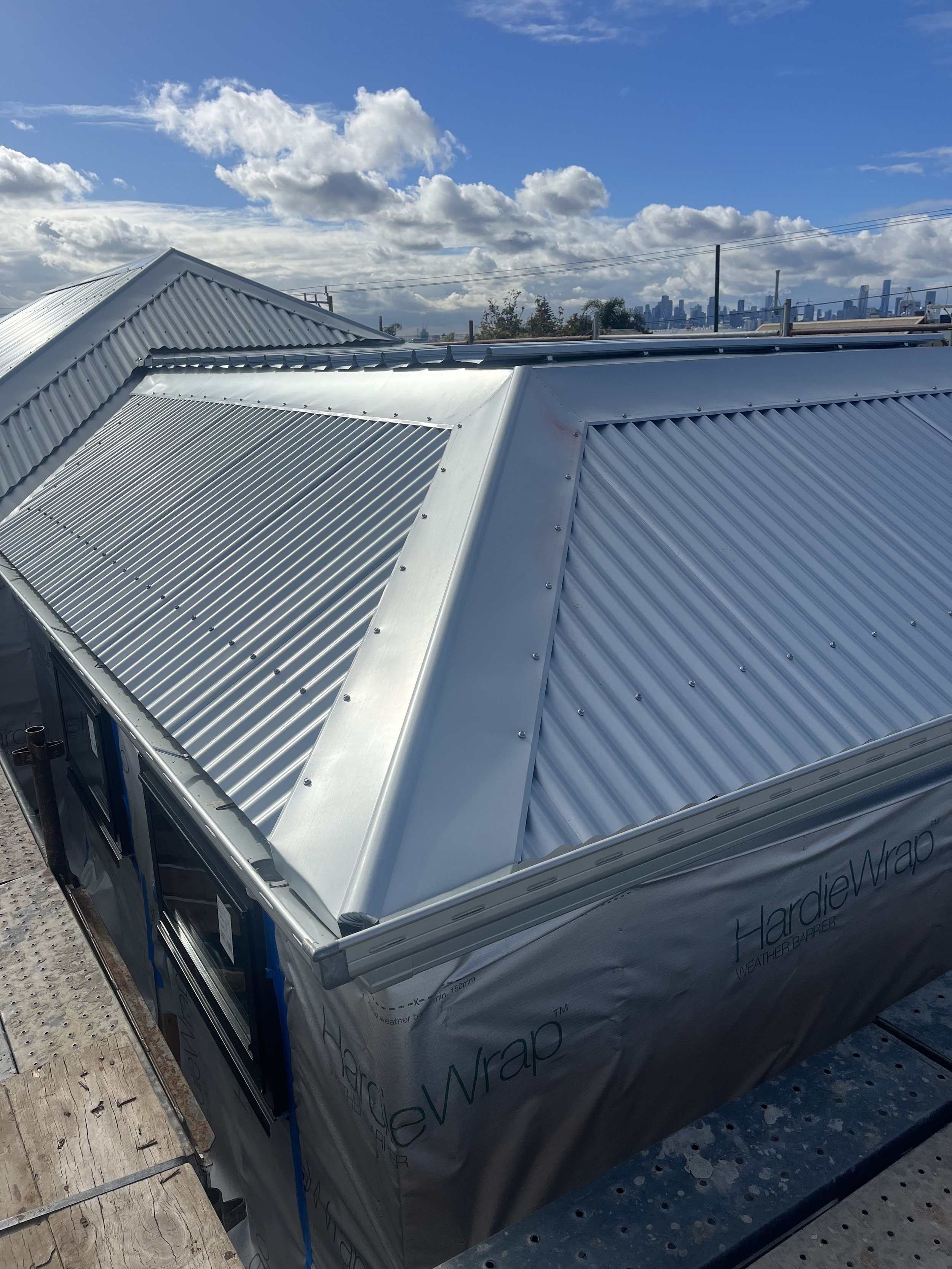 Aerial view of new Colorbond metal roof installation by M Metal Roofing & Plumbing Group