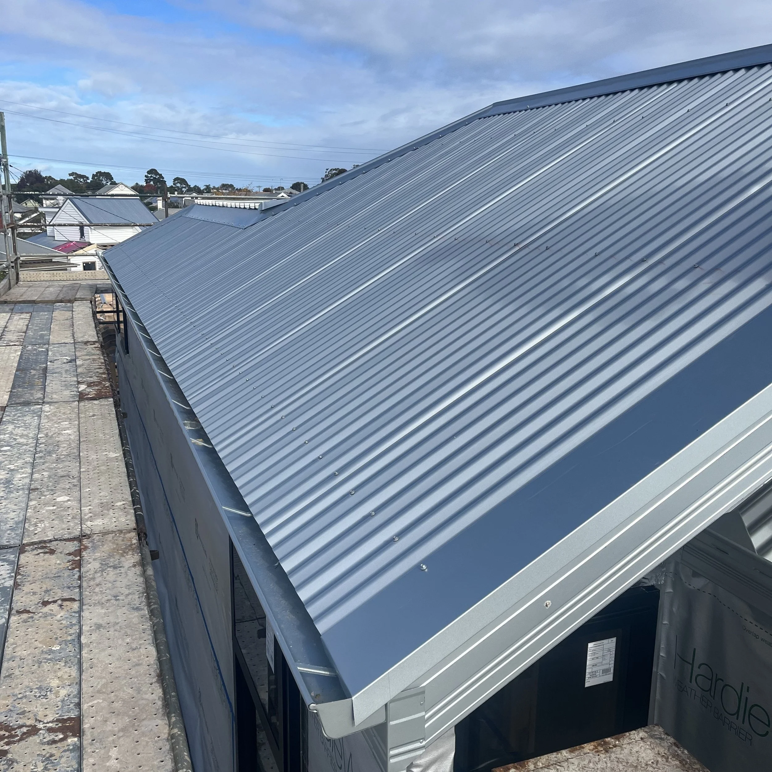 Completed Colorbond metal roof and gutter installation by M Metal Roofing & Plumbing Group
