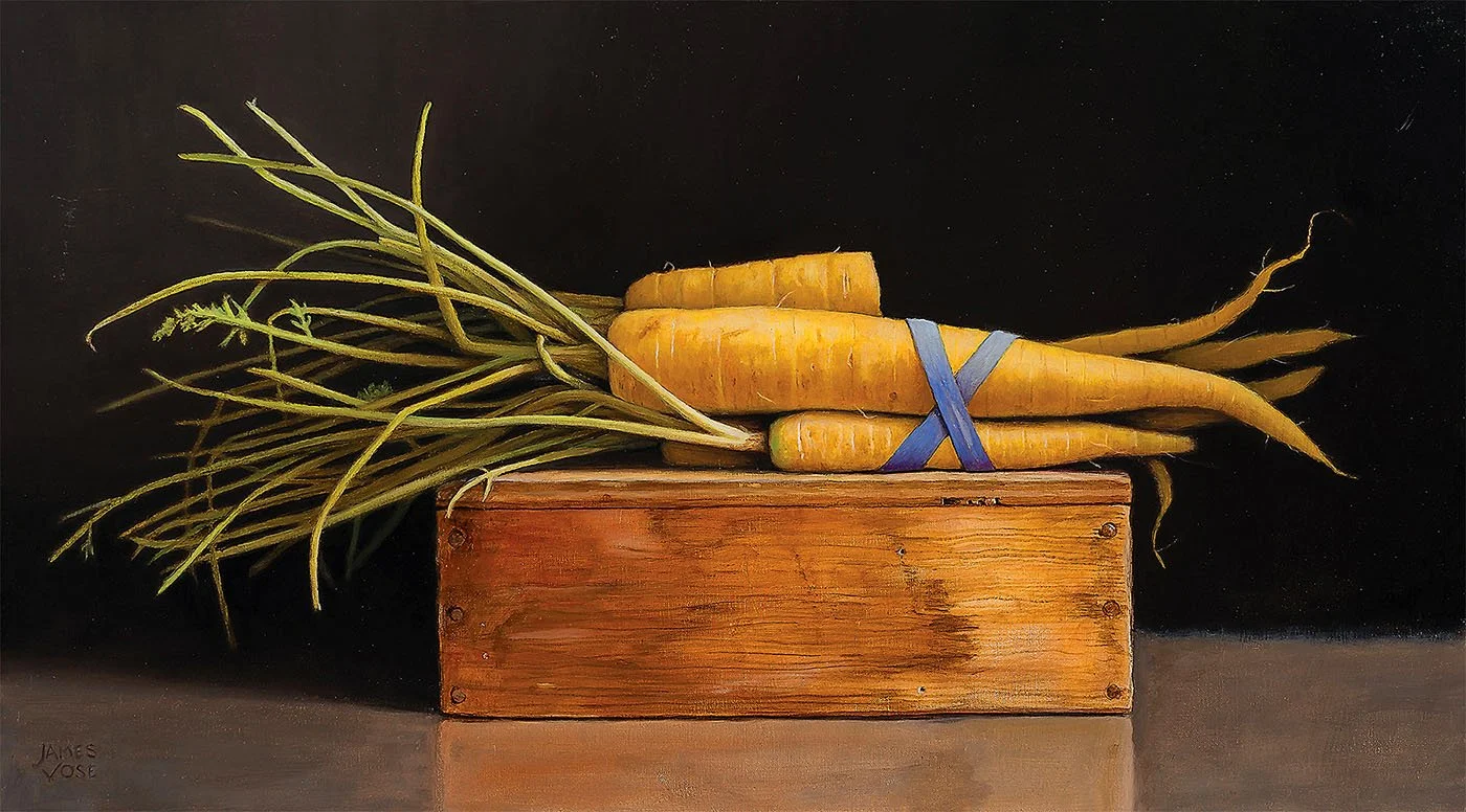 Oil painting by James Vose titled 'Yellow Carrots or Malvolio in the Dark Room' featuring a bundle of yellow carrots with green tops tied with a blue ribbon, resting on a rustic wooden box against a dark background.