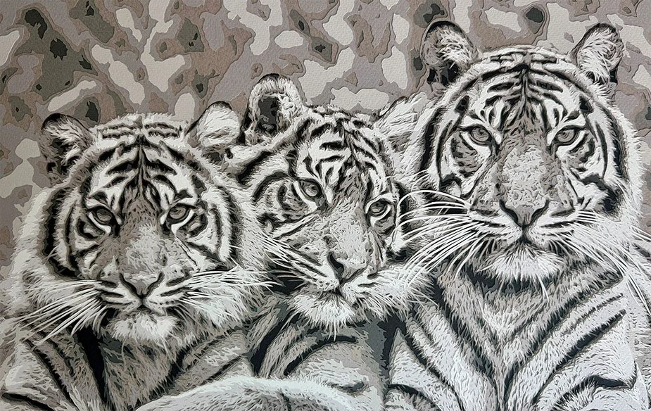 Hand-cut paper artwork by Sarah Lake featuring a detailed trio of Sumatran tigers, highlighting intricate textures and patterns.