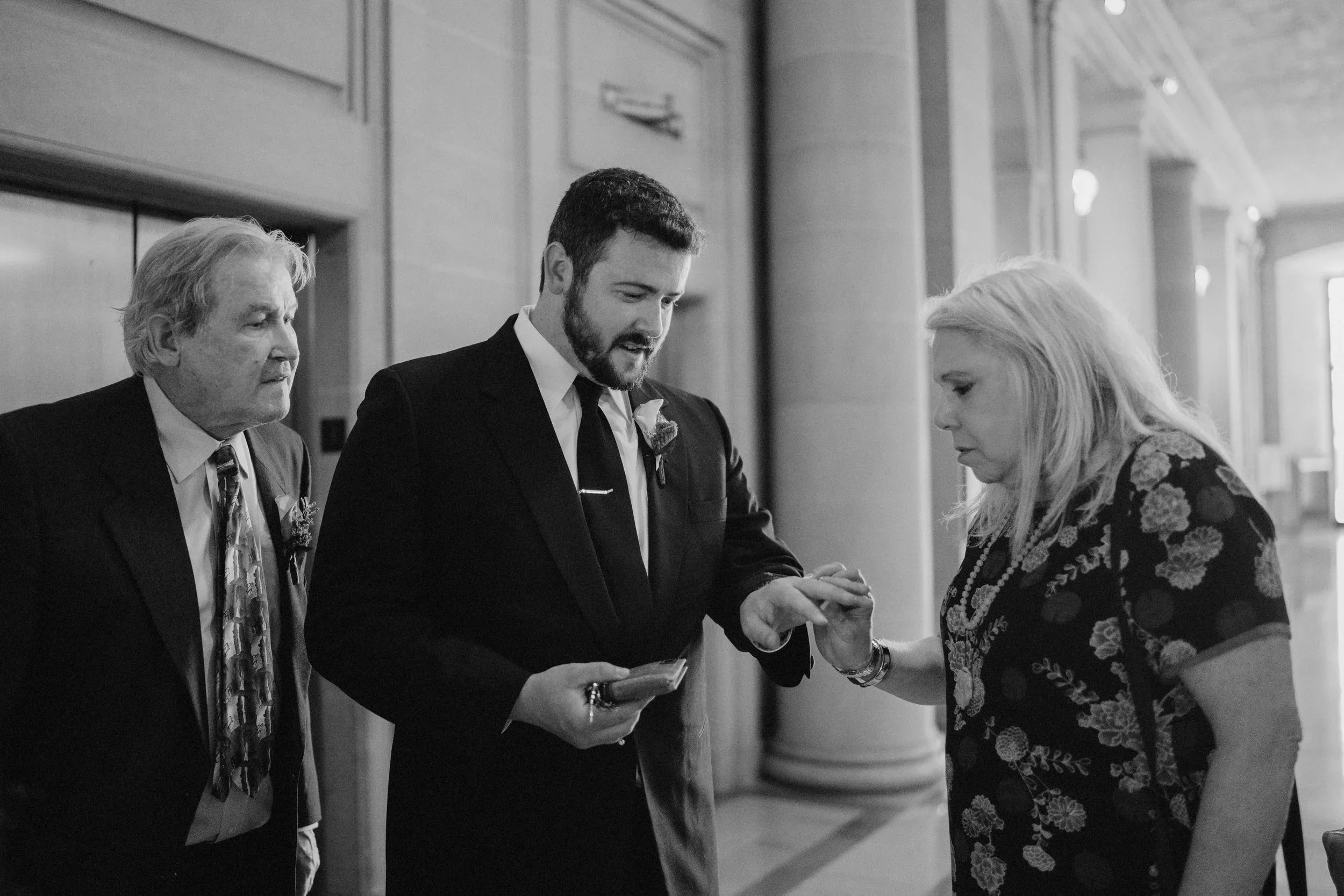 Couple getting married, taken by san francisco city hall wedding photographer​