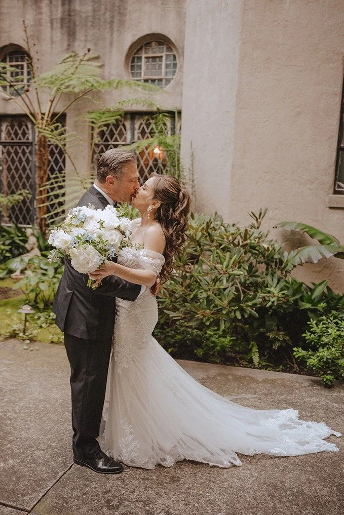 the bride and groom at their historic wedding venue in california